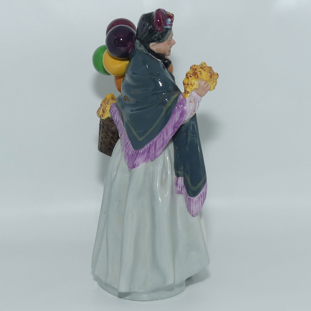 HN1843 Royal Doulton figurine Biddy Penny Farthing | Character Figures