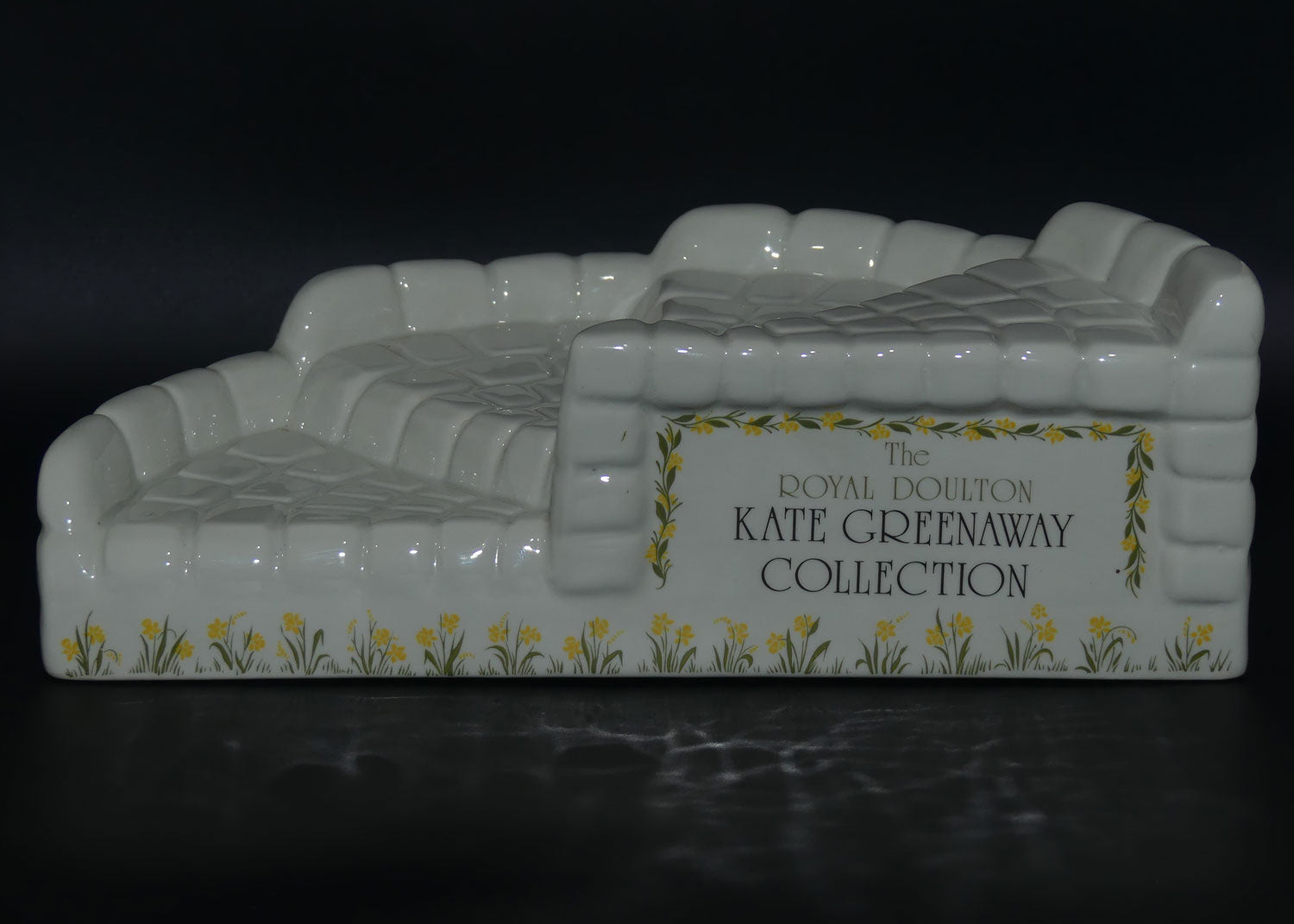 Royal Doulton display stand for the Kate Greenaway Collection figurines