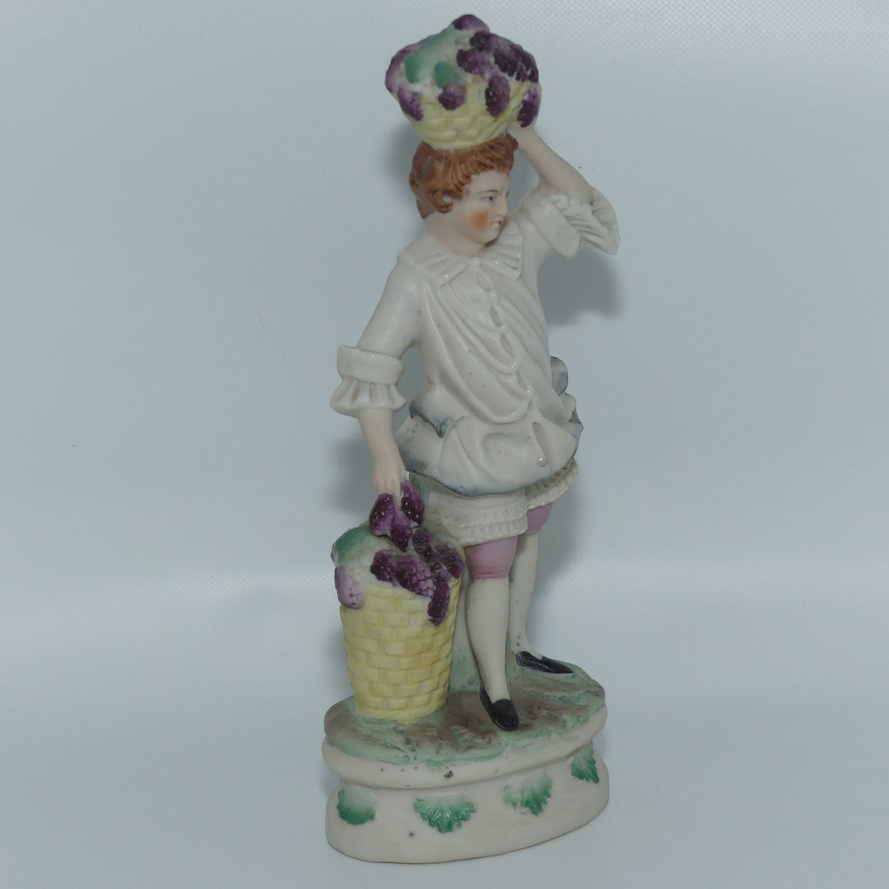 German Bisque Boy with Baskets of Grapes c.1900