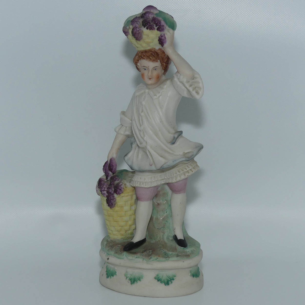 German Bisque Boy with Baskets of Grapes c.1900