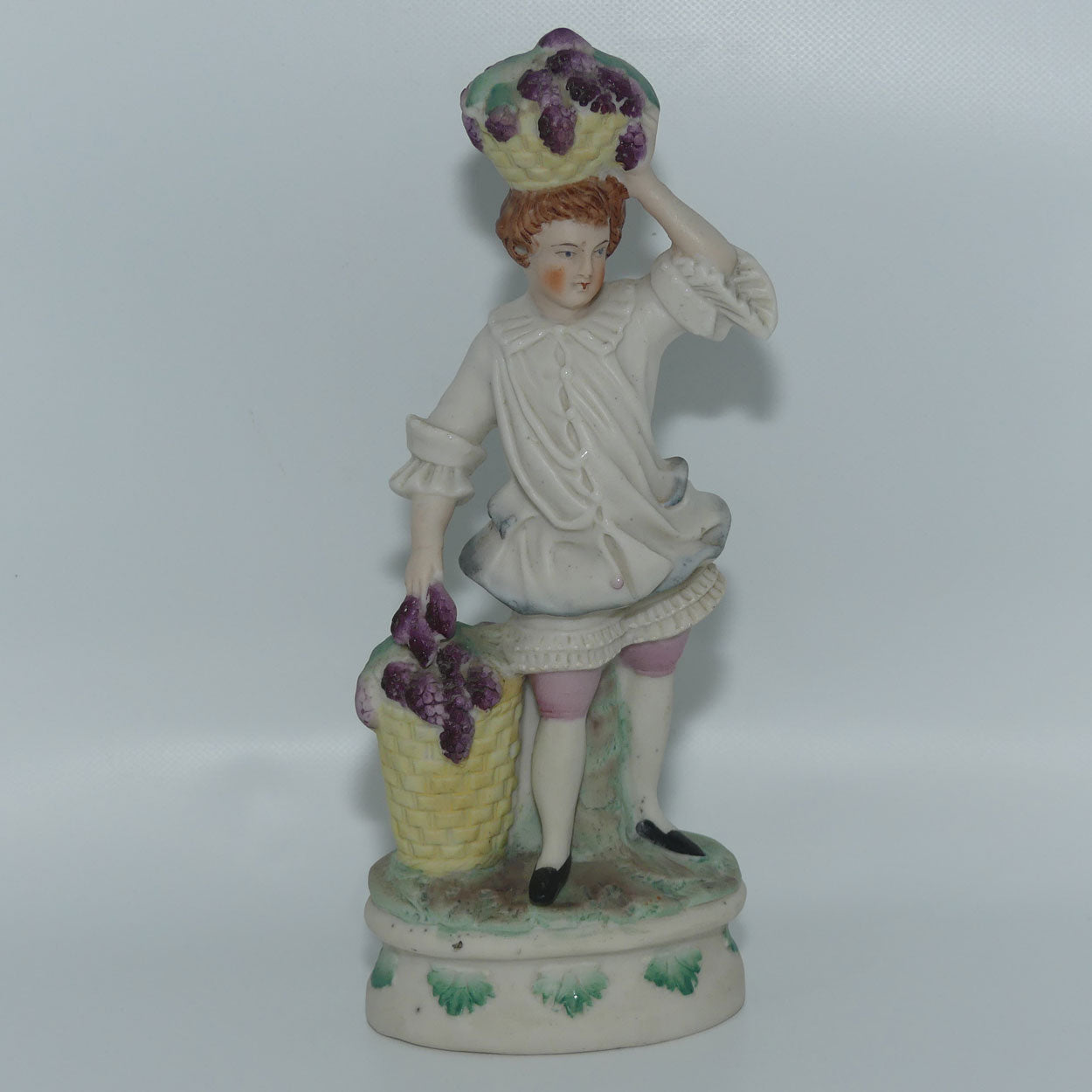 German Bisque Boy with Baskets of Grapes c.1900