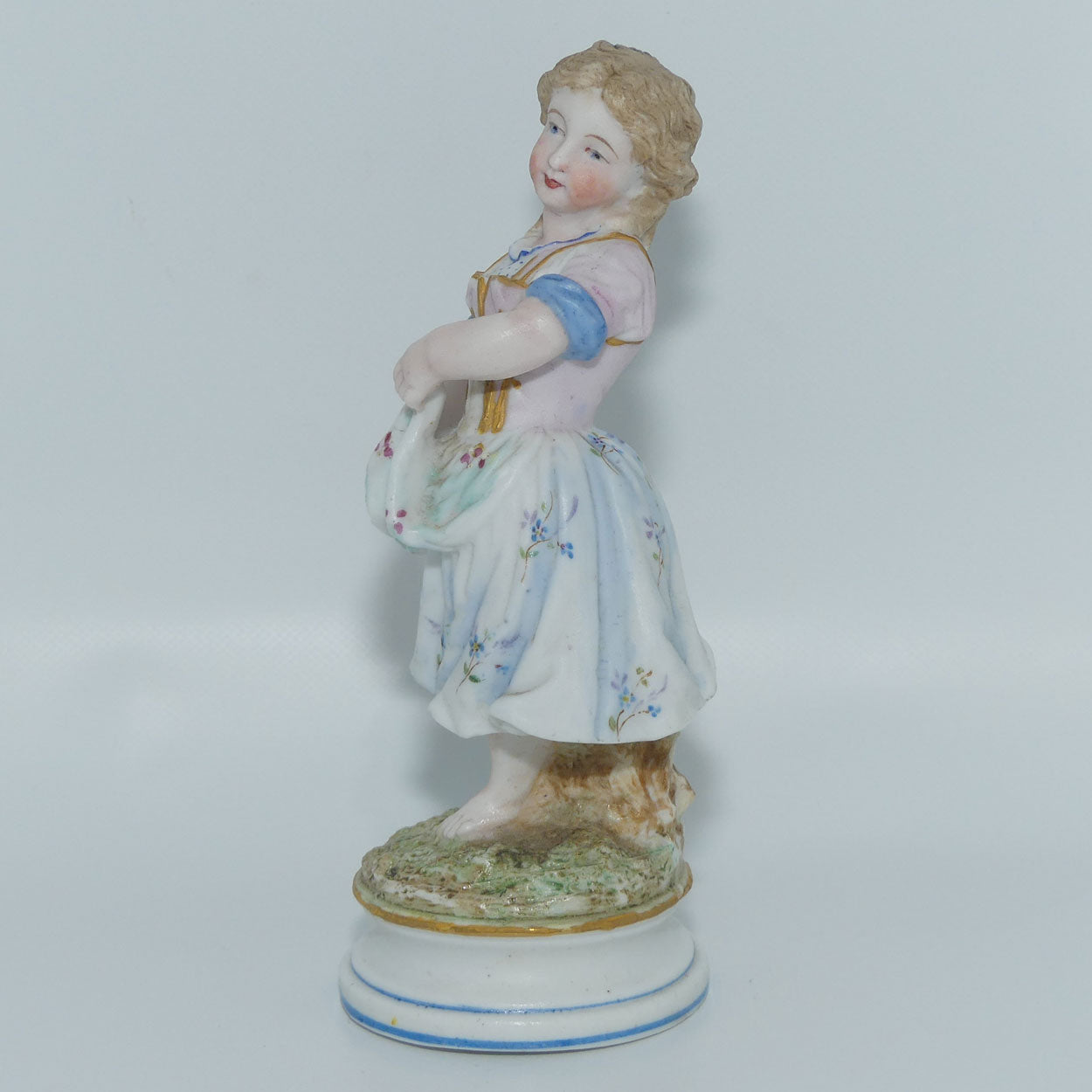 German Bisque Girl with Floral decorated dress and Gilt Decor c.1900