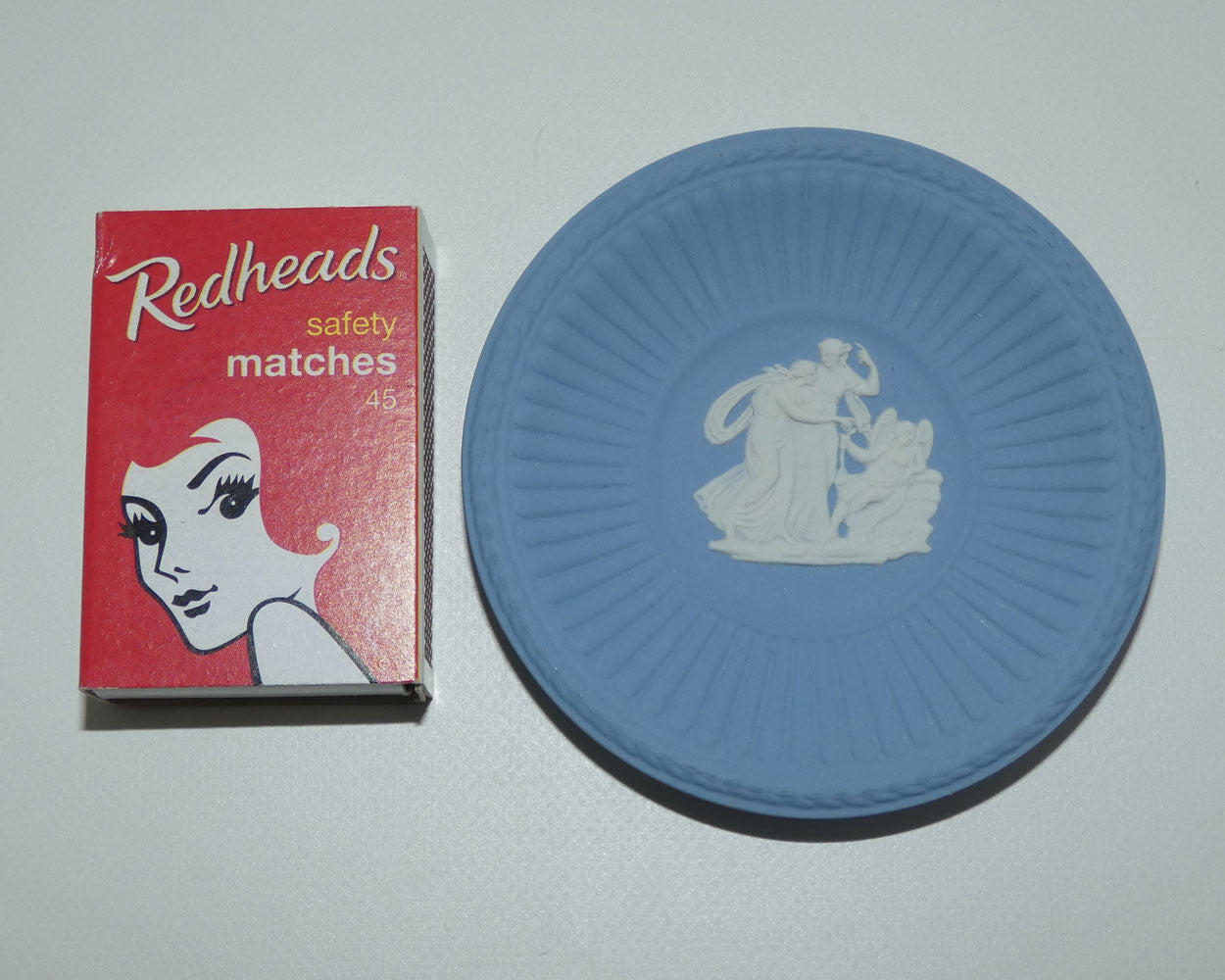 wedgwood-jasper-white-on-pale-blue-cupid-asleep-tiny-plate-7-5cm