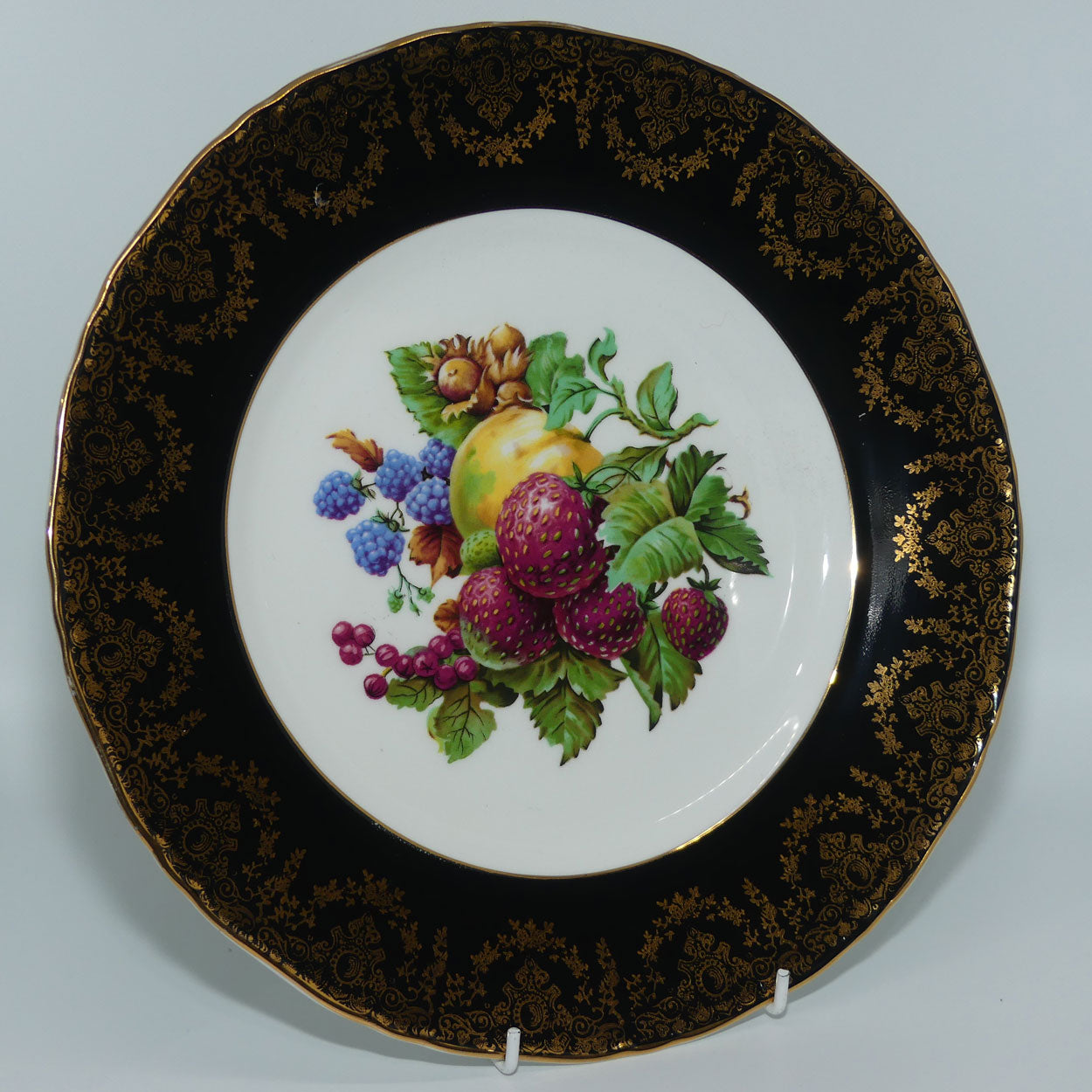 fine-quality-fruit-motif-plate-dark-border-gilt-trim