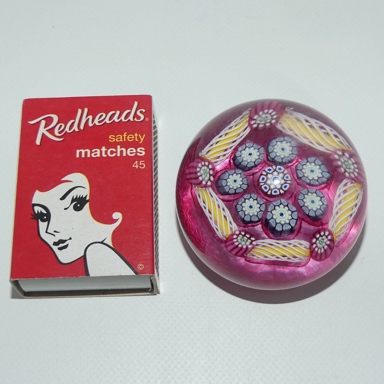 john-deacons-scotland-complex-latticino-garland-miniature-paperweight-cranberry