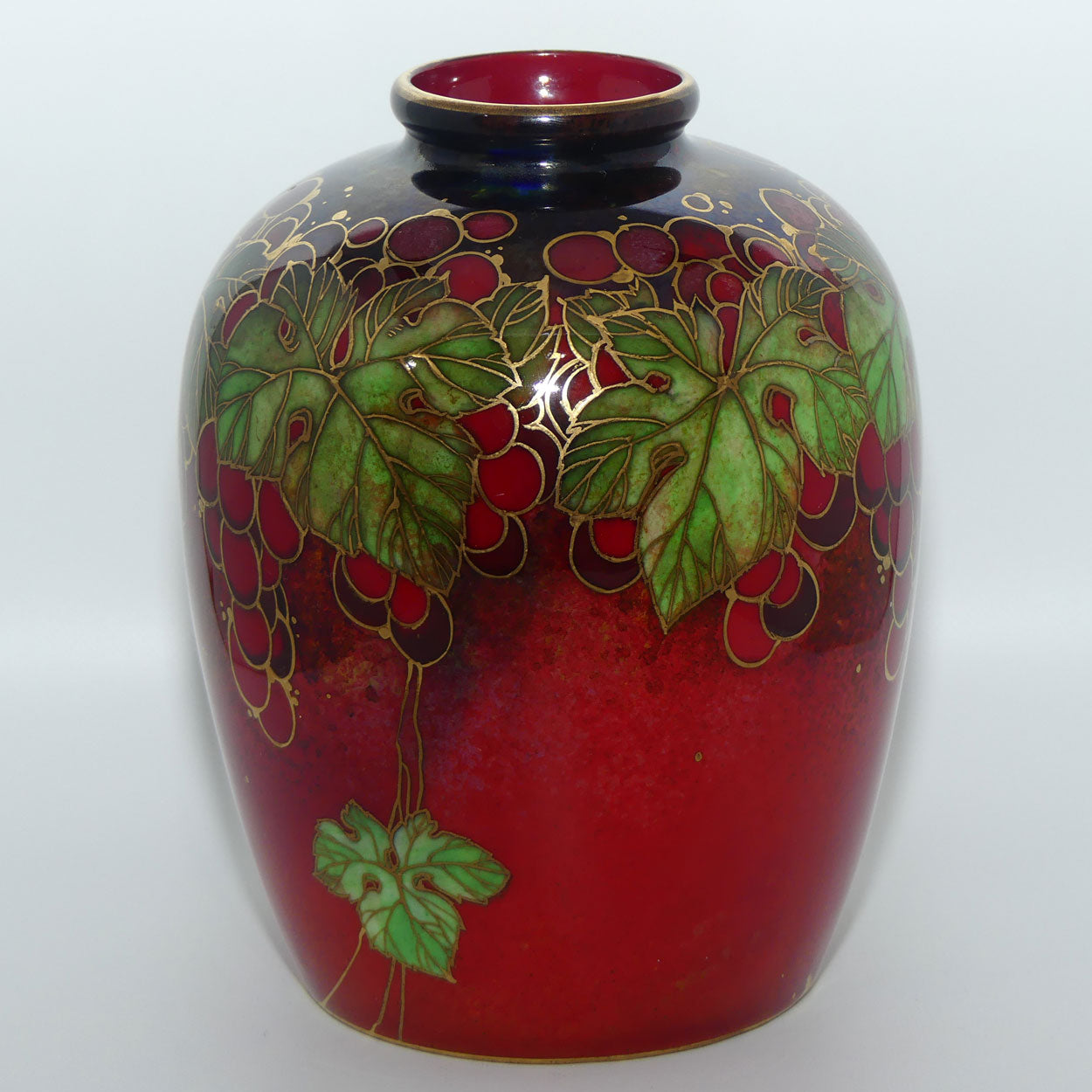 royal-doulton-flambe-leaves-and-grapes-vase-with-gilt-highlights-nixon