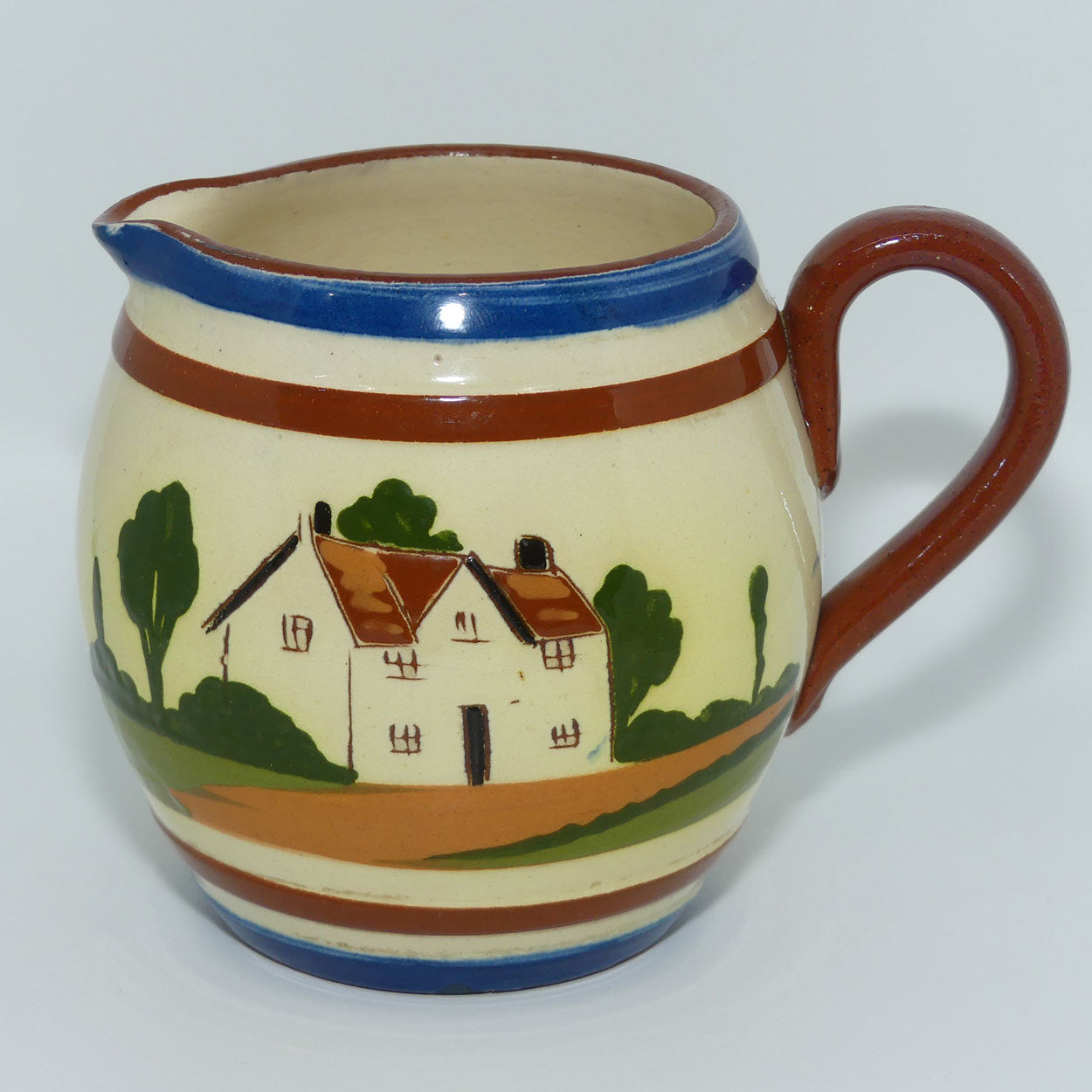 torquay-ware-motto-ware-globe-shape-milk-jug