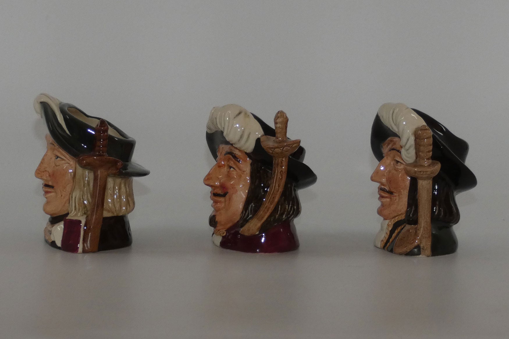 d6508-d6516-royal-doulton-miniature-character-jug-set-three-musketeers