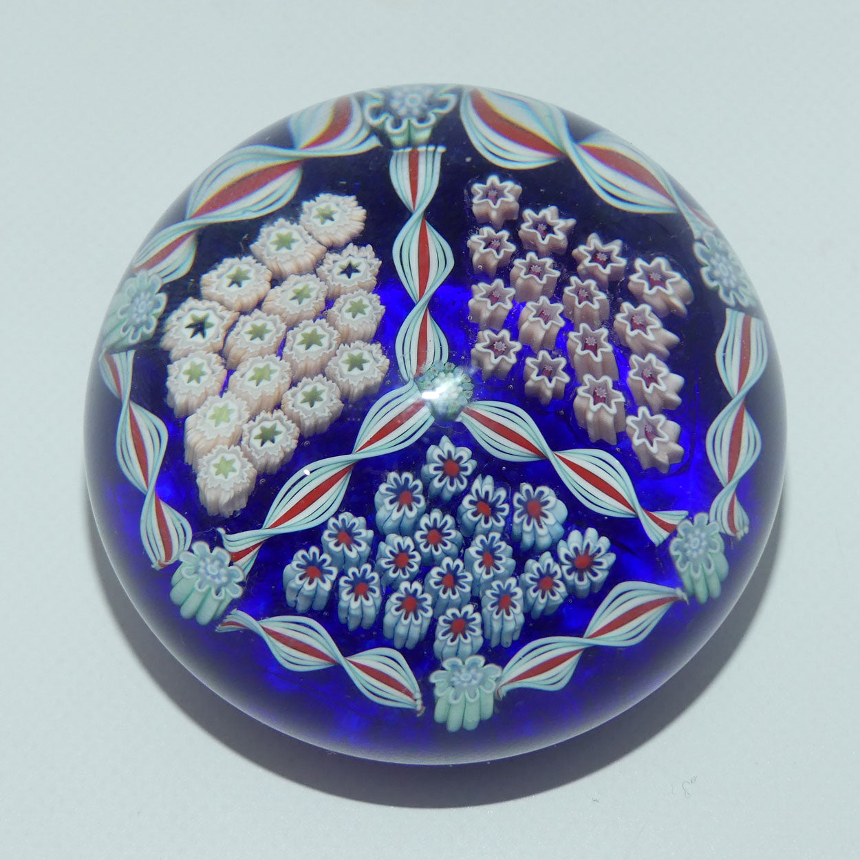 john-deacons-scotland-millefiori-triple-spoke-hub-small-paperweight-blue