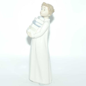 Nao by Lladro figure Boy in Nightshirt with Books #0233