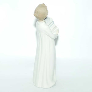 Nao by Lladro figure Boy in Nightshirt with Books #0233