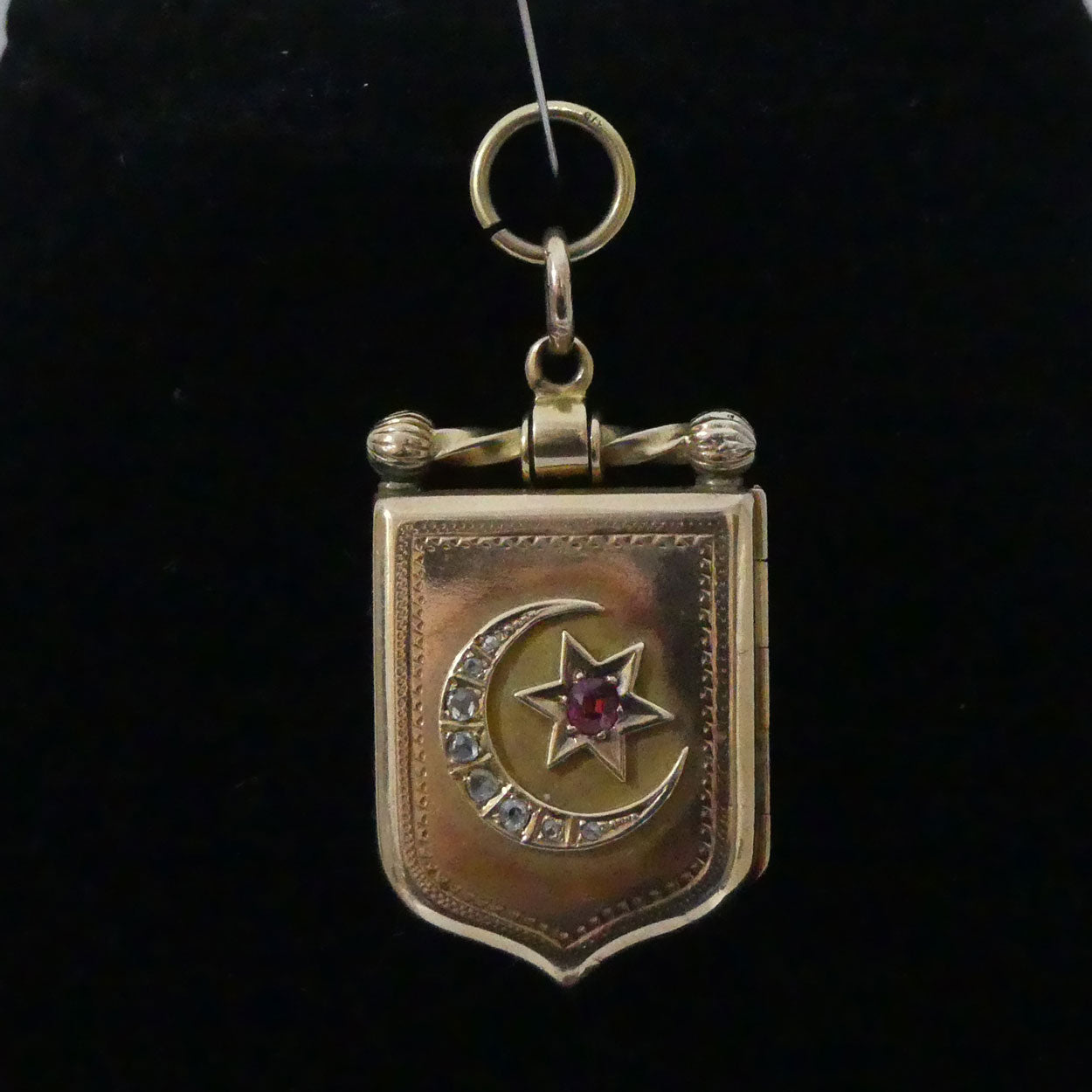 Victorian era 15ct Yellow Gold Garnet and 8 Diamond locket | Valued $8500