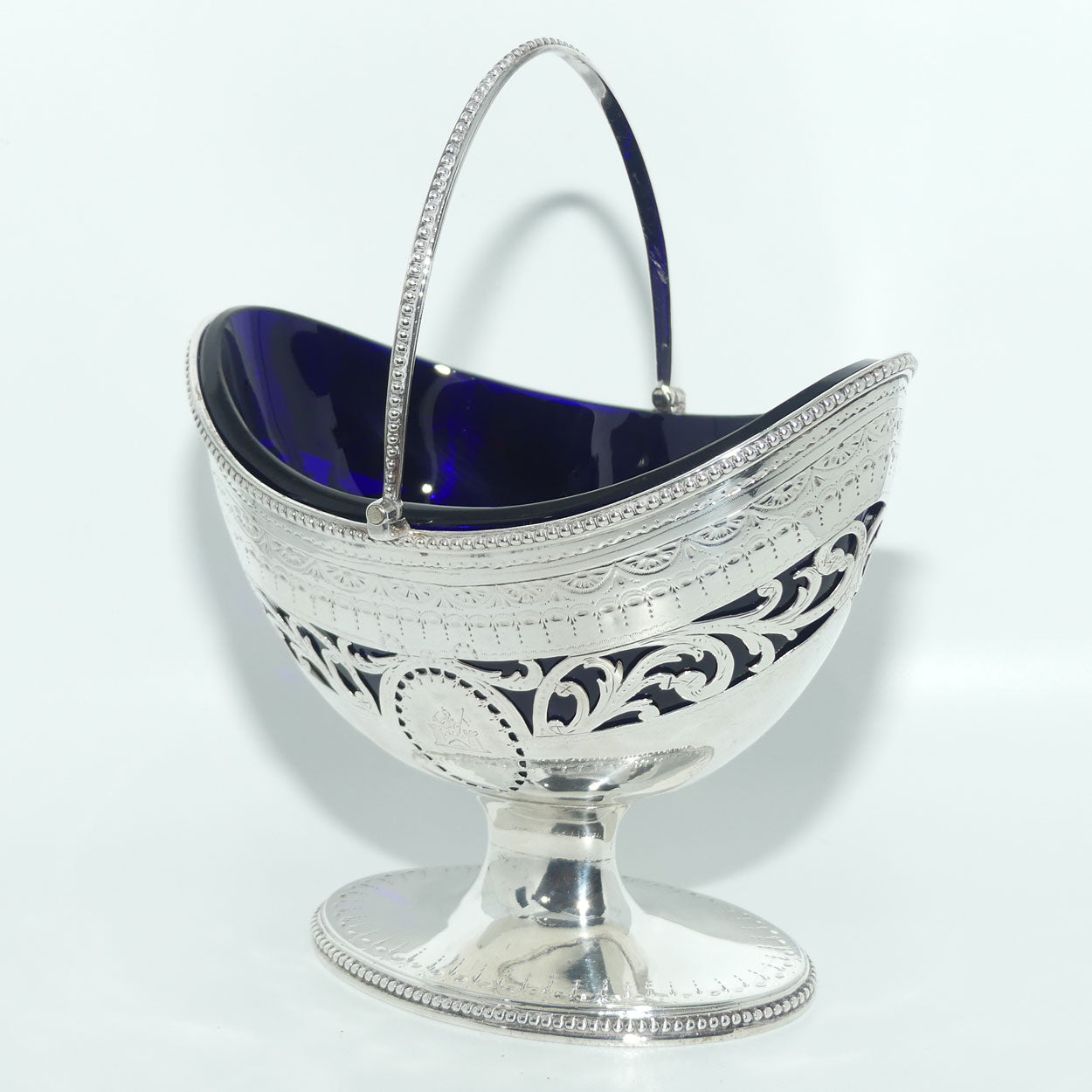 George III Sterling Silver sugar basket with original blue glass liner | London 1783