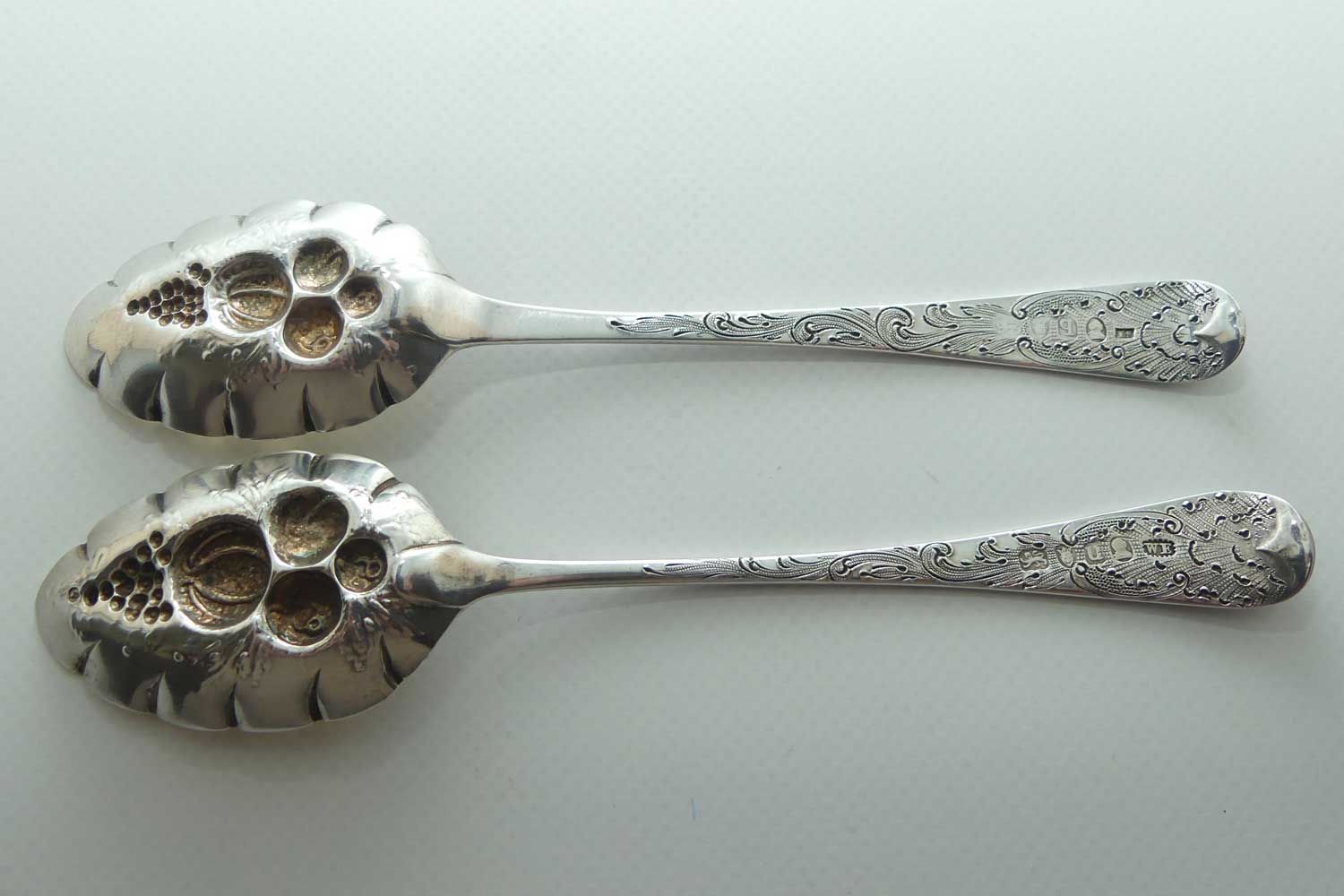 Pair Georgian era GeoIII Sterling Silver berry spoons with gilt wash bowls | London 1791 and 1795 | different makers