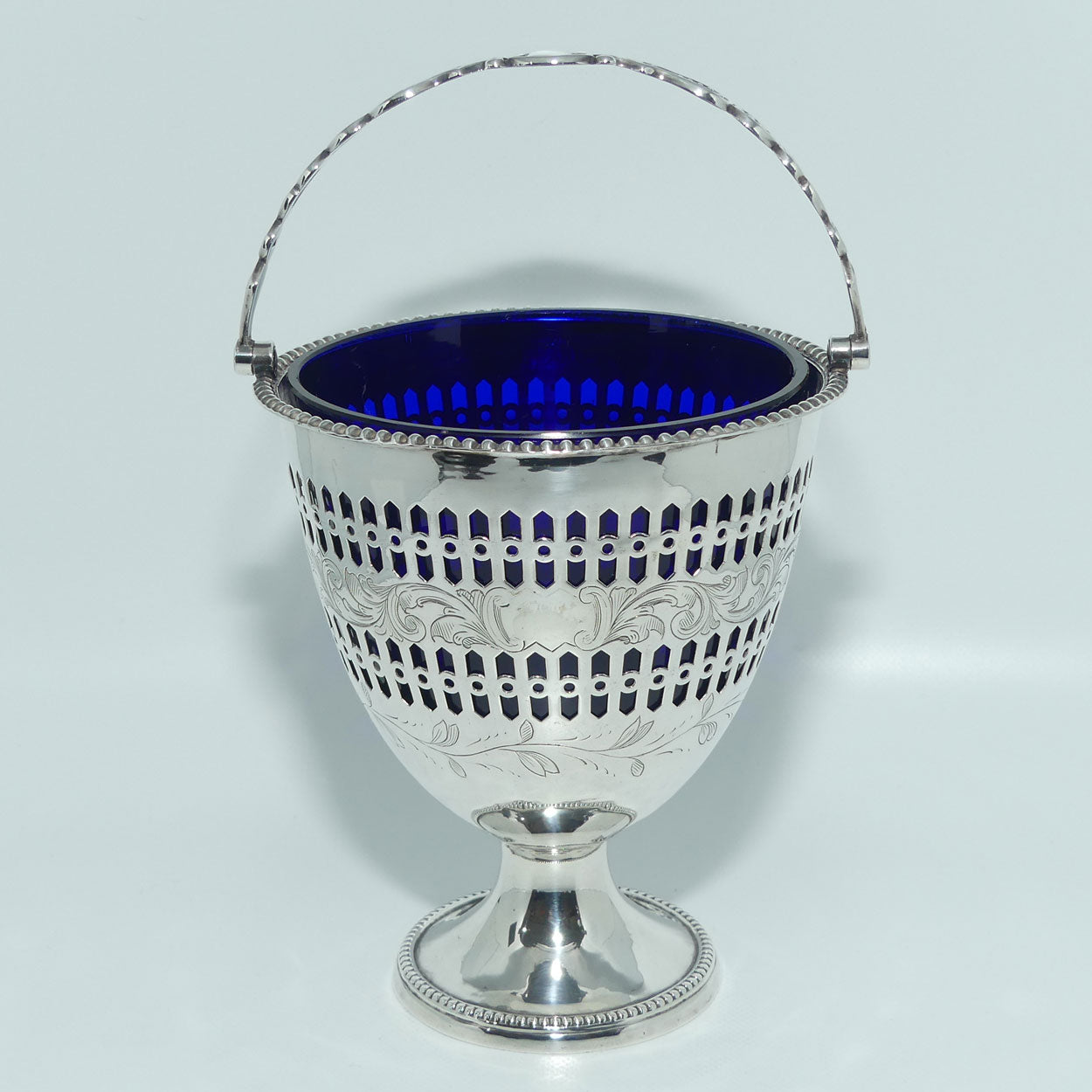 Victorian | Sterling Silver sugar basket with pierced decoration, bead edge and blue glass liner | Sheffield 1850