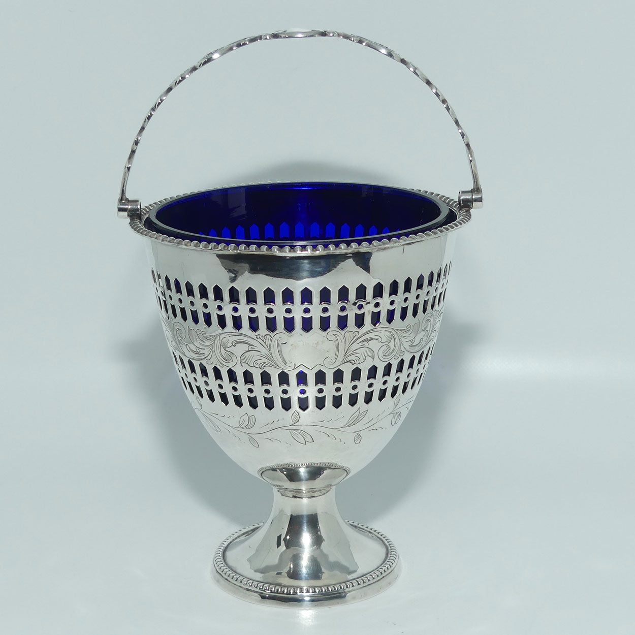 Victorian | Sterling Silver sugar basket with pierced decoration, bead edge and blue glass liner | Sheffield 1850