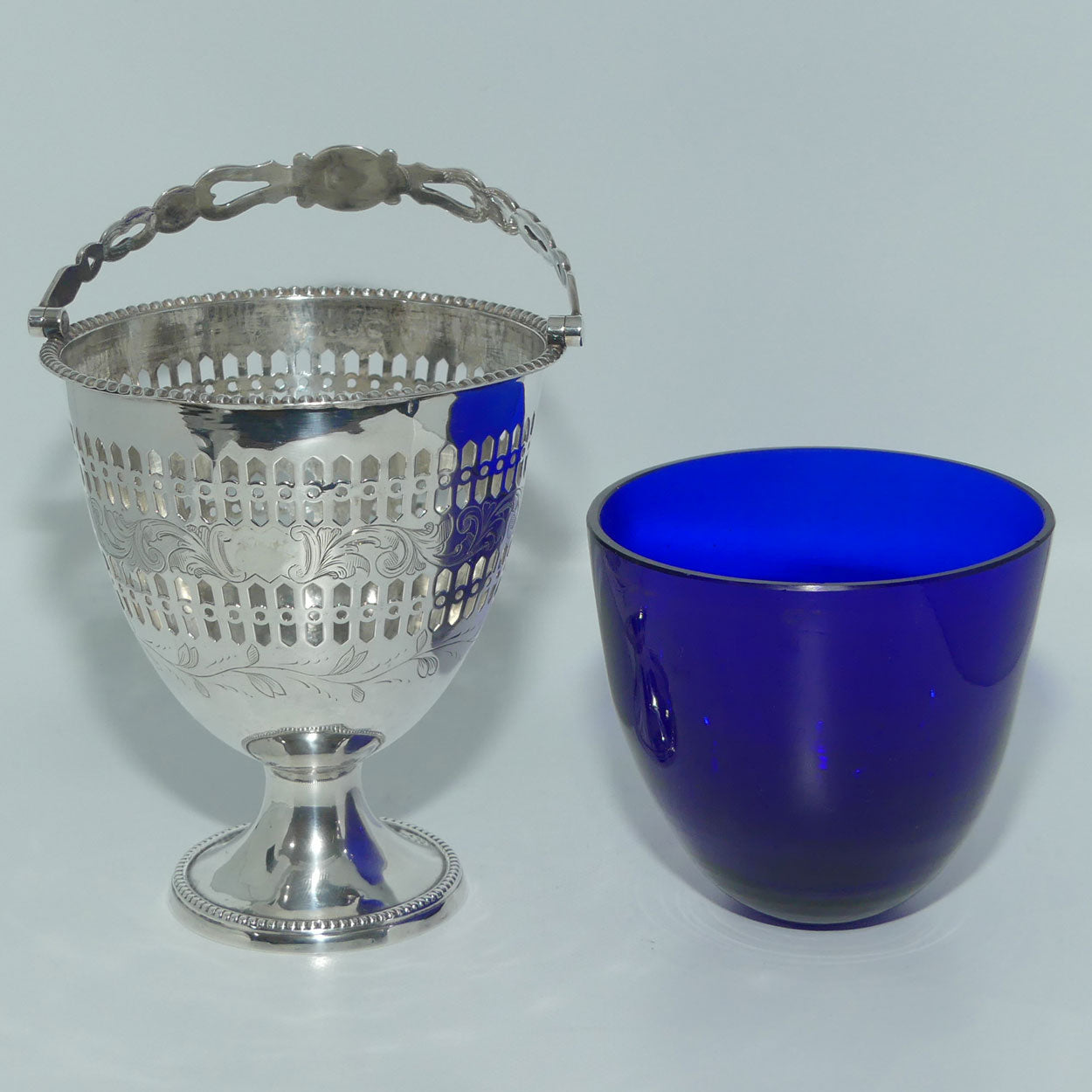 Victorian | Sterling Silver sugar basket with pierced decoration, bead edge and blue glass liner | Sheffield 1850