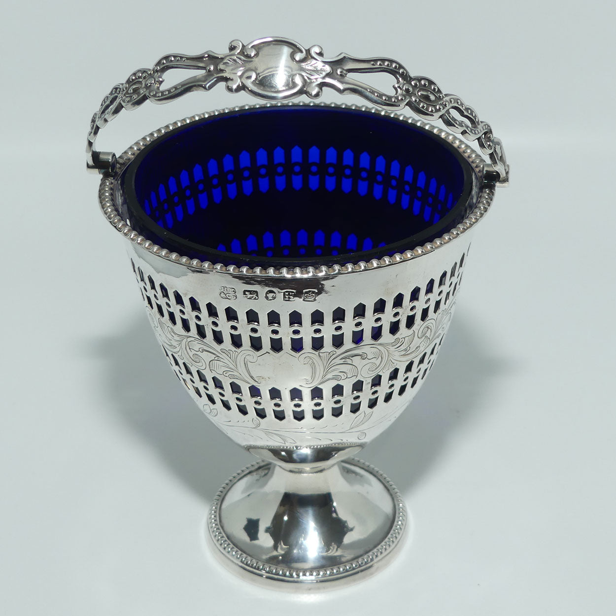 Victorian | Sterling Silver sugar basket with pierced decoration, bead edge and blue glass liner | Sheffield 1850