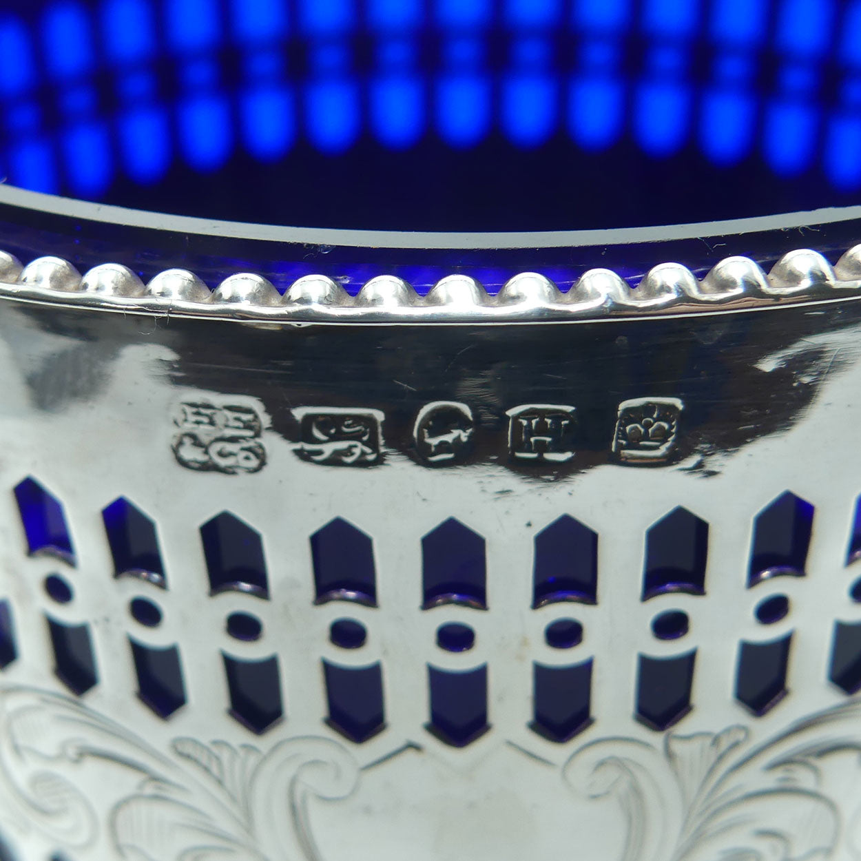 Victorian | Sterling Silver sugar basket with pierced decoration, bead edge and blue glass liner | Sheffield 1850
