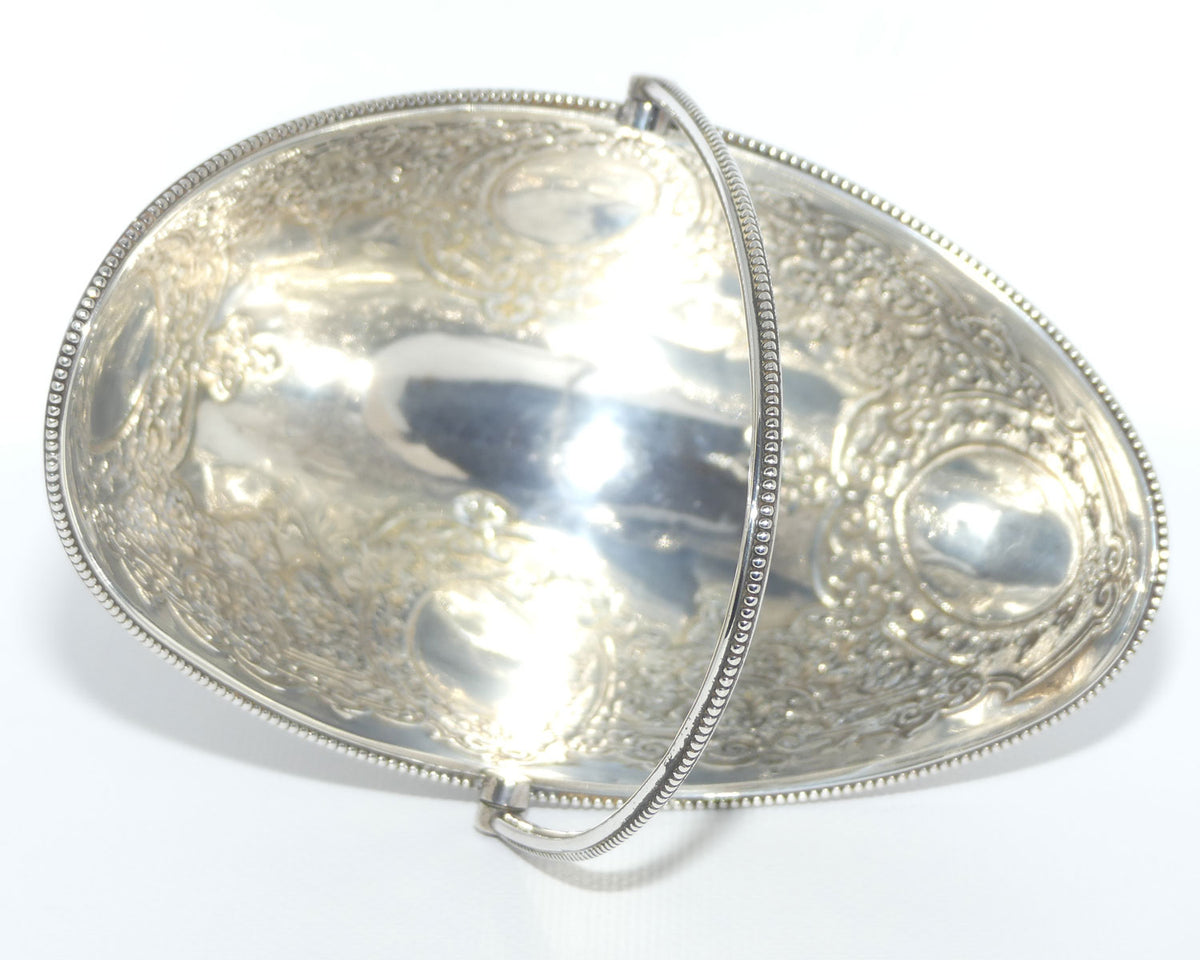 Victorian era Sterling Silver swing handle collet foot sugar basket | London 1875 | Martin Hall & Co