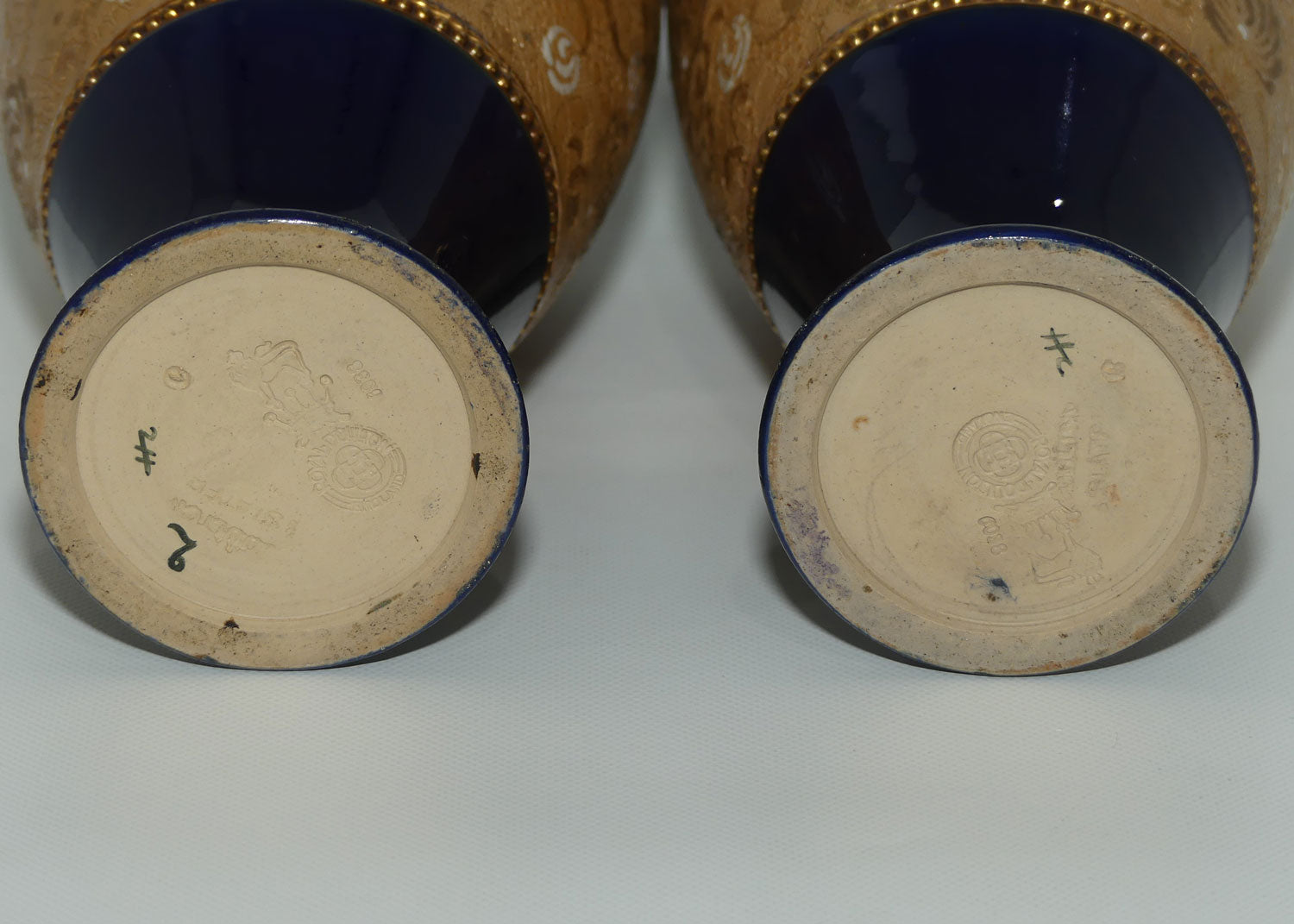 Doulton Slaters pair of stoneware vases with white enamelling & gilt highlights (stamped 6038)