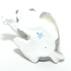 Lladro figure New Friend | Dog with Snail on Paw #6211