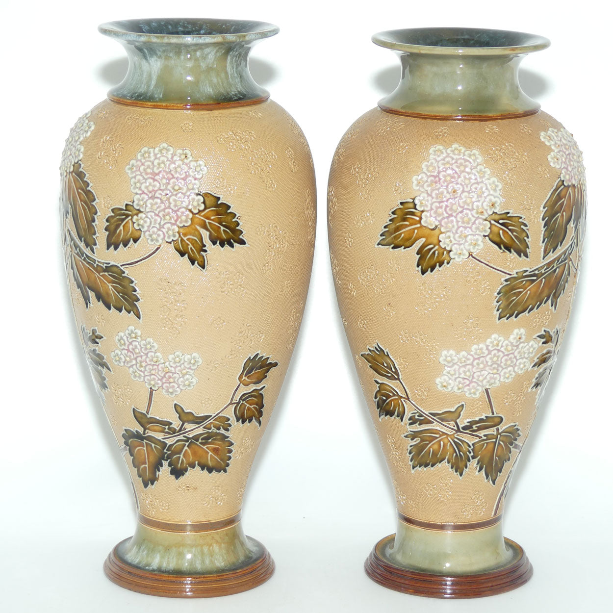 Doulton Slaters pair of stoneware foliage and flowers vases (stamped 6482)