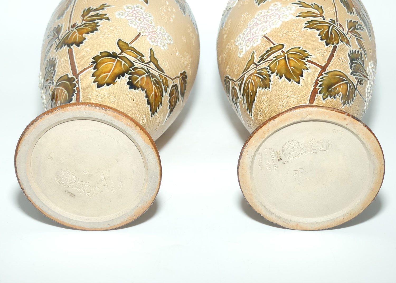 Doulton Slaters pair of stoneware foliage and flowers vases (stamped 6482)