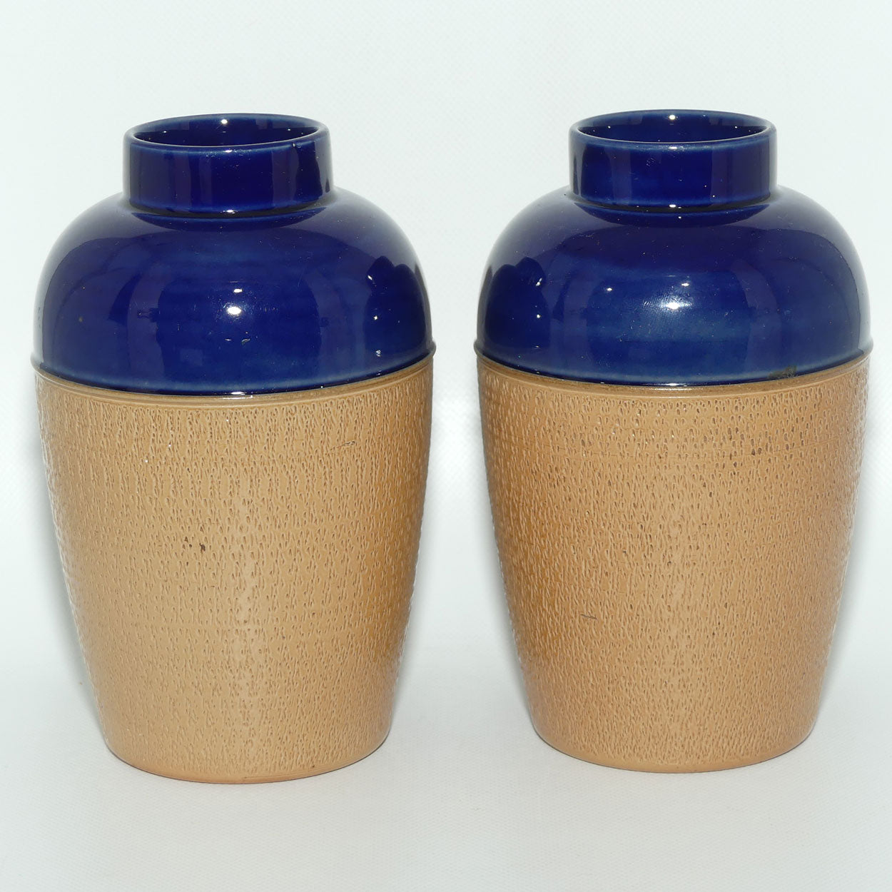 Royal Doulton pair of small stoneware vases with stippled finish | Blue tops | 7360