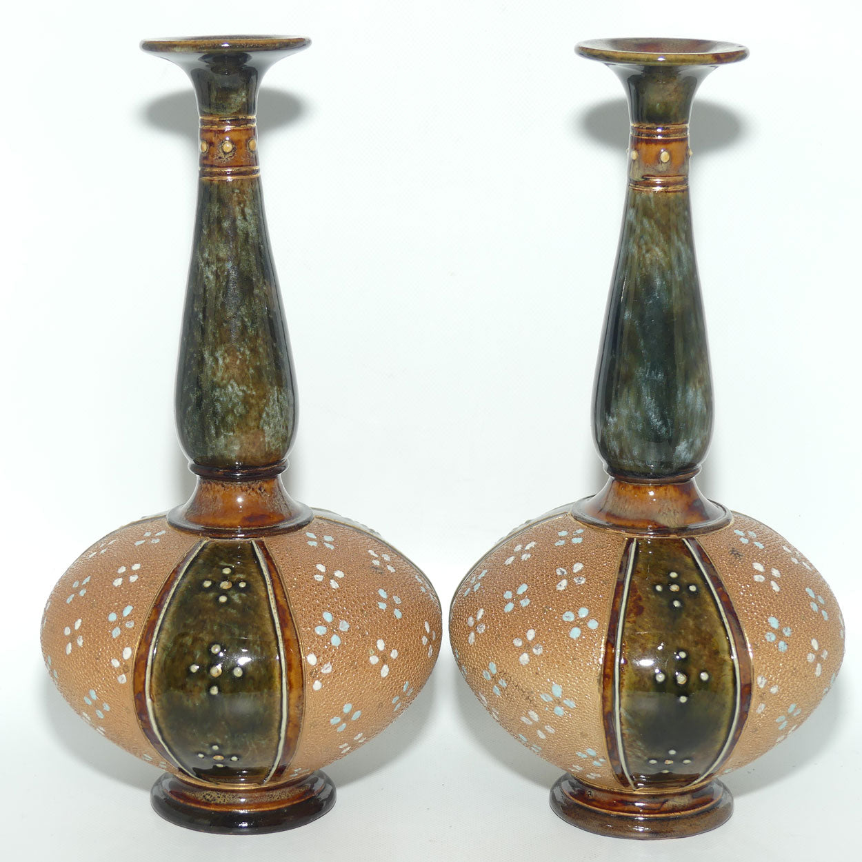 Royal Doulton stoneware pair of narrow neck bulbous vases with blue & white enamelling highlights (stamped 8331)