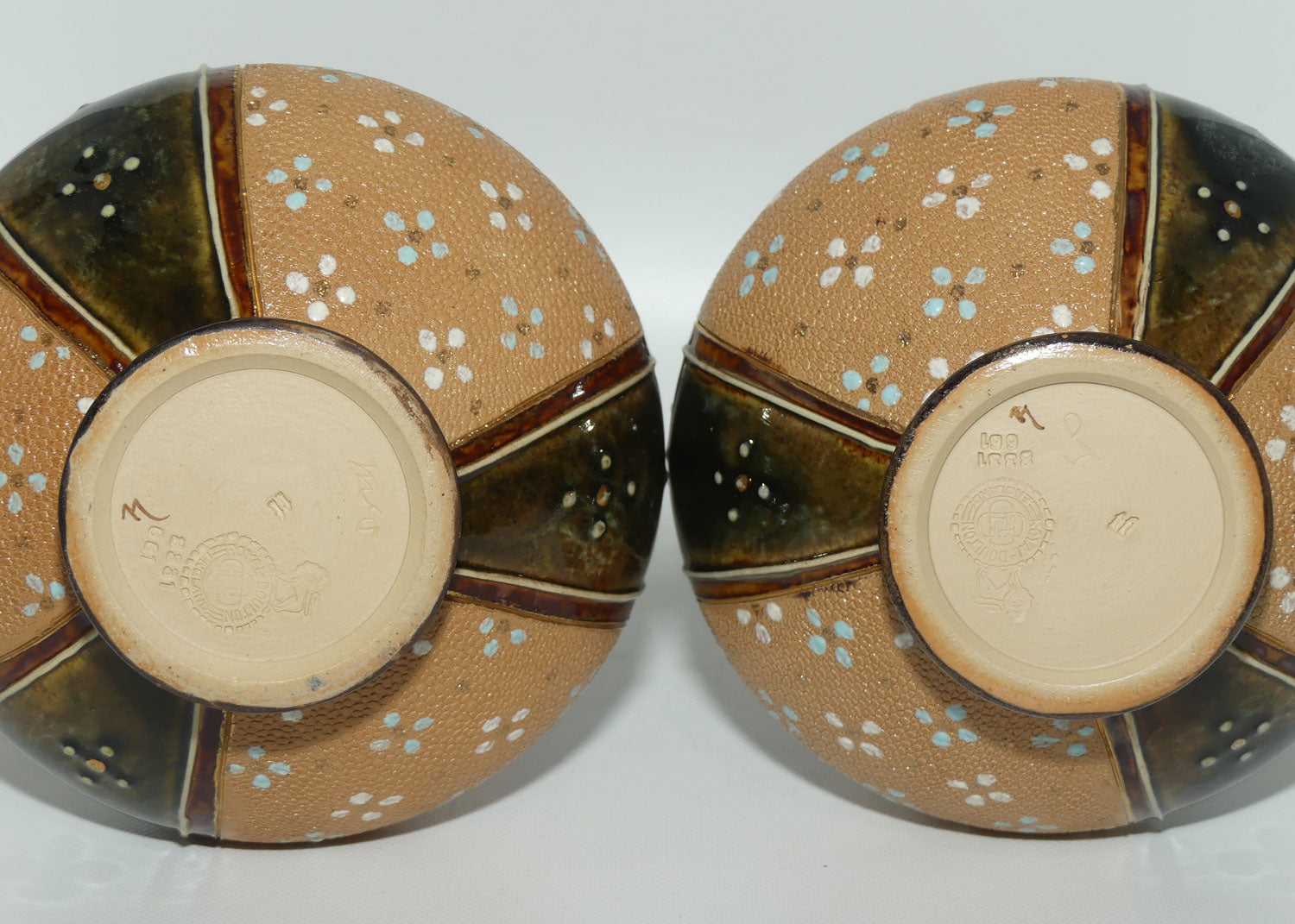 Royal Doulton stoneware pair of narrow neck bulbous vases with blue & white enamelling highlights (stamped 8331)