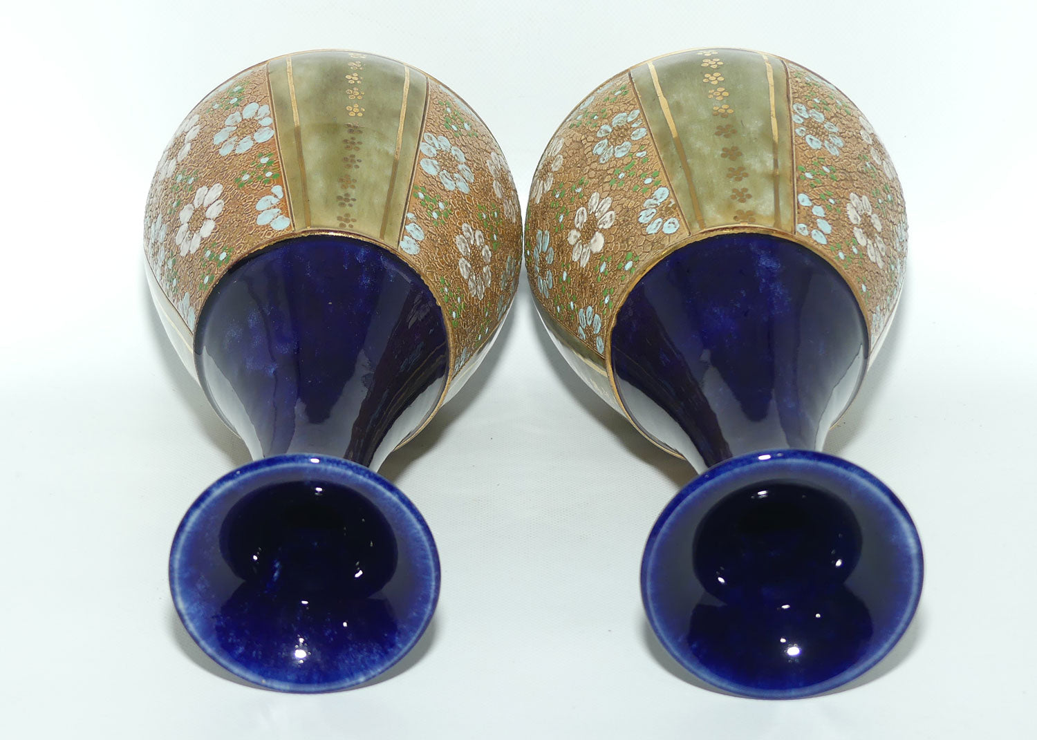 Royal Doulton pair of stoneware vases with blue, green & white enamelled flowers and gilt highlights (stamped 8334) #1