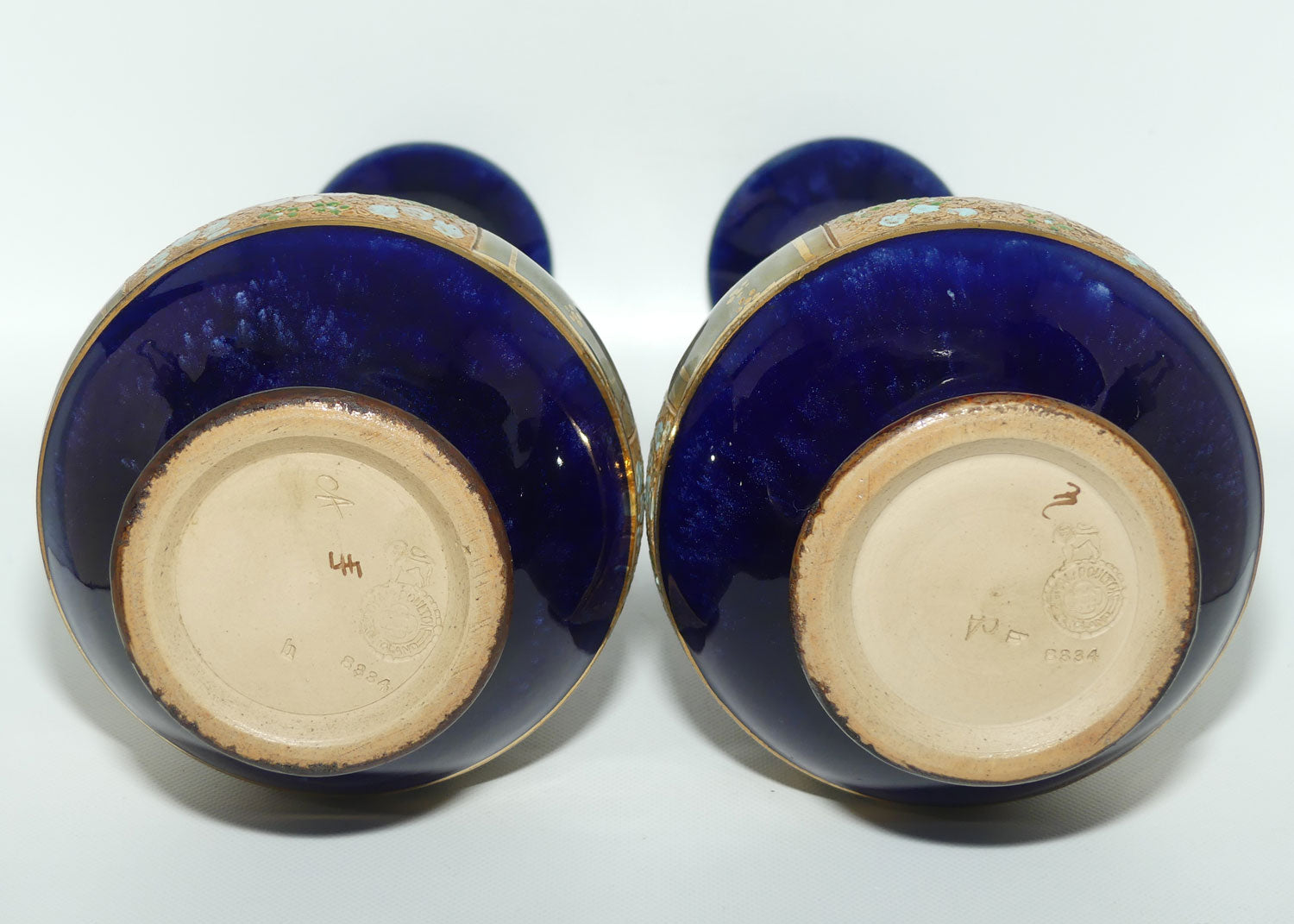 Royal Doulton pair of stoneware vases with blue, green & white enamelled flowers and gilt highlights (stamped 8334) #1