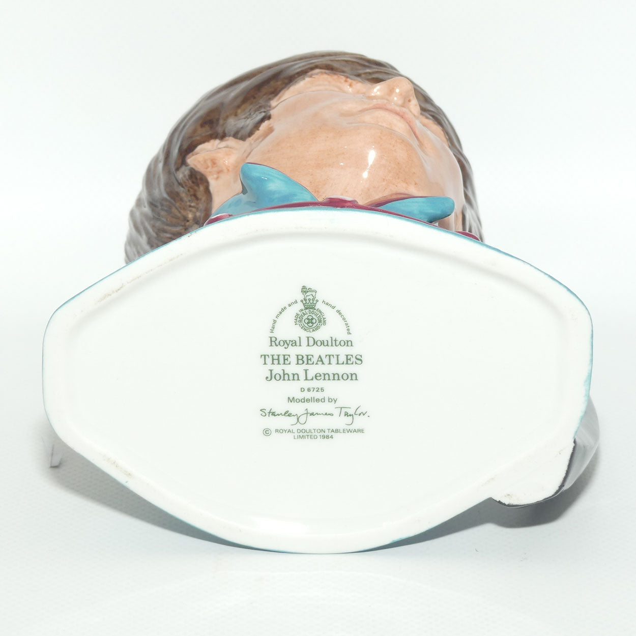 D6725 Royal Doulton mid size character jug John Lennon (Turquoise Jacket)