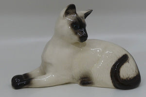 DA124 Royal Doulton Siamese Cat | Lying Looking Back