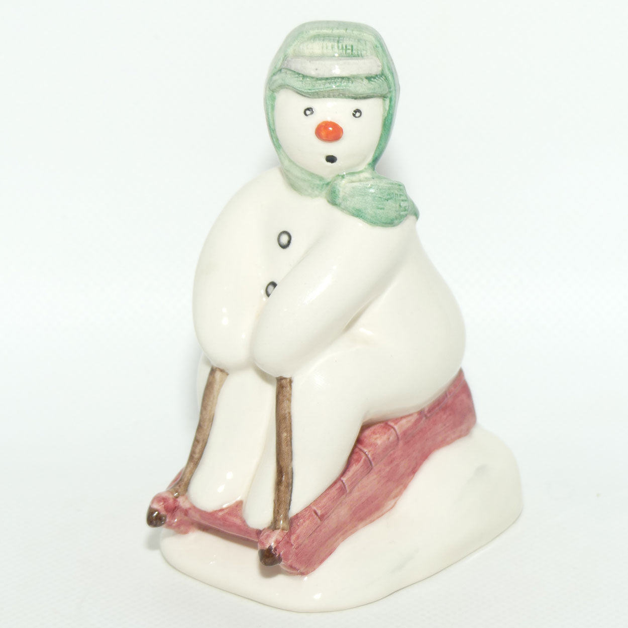 DS20 Royal Doulton Snowman figure The Snowman Toboganning