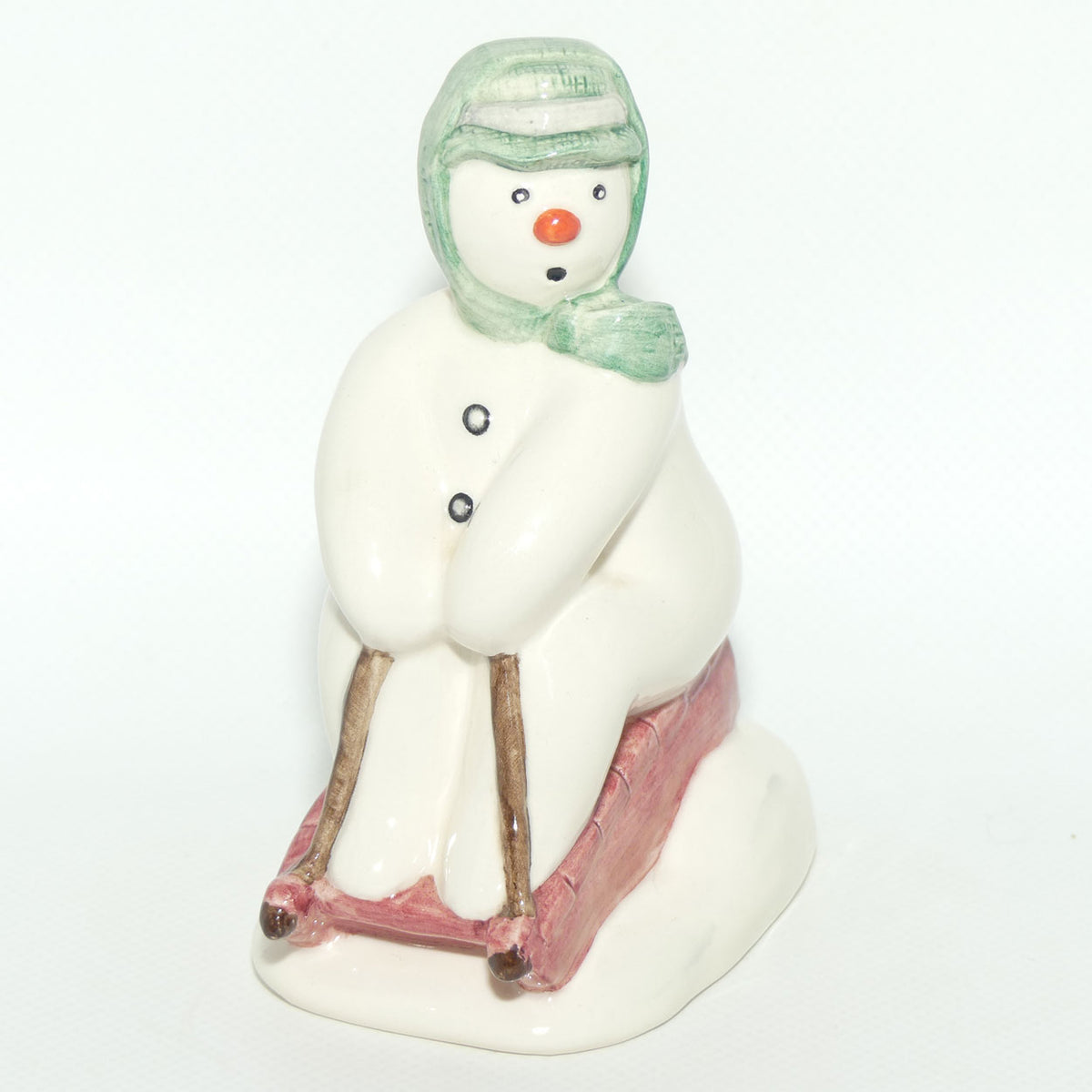 DS20 Royal Doulton Snowman figure The Snowman Toboganning
