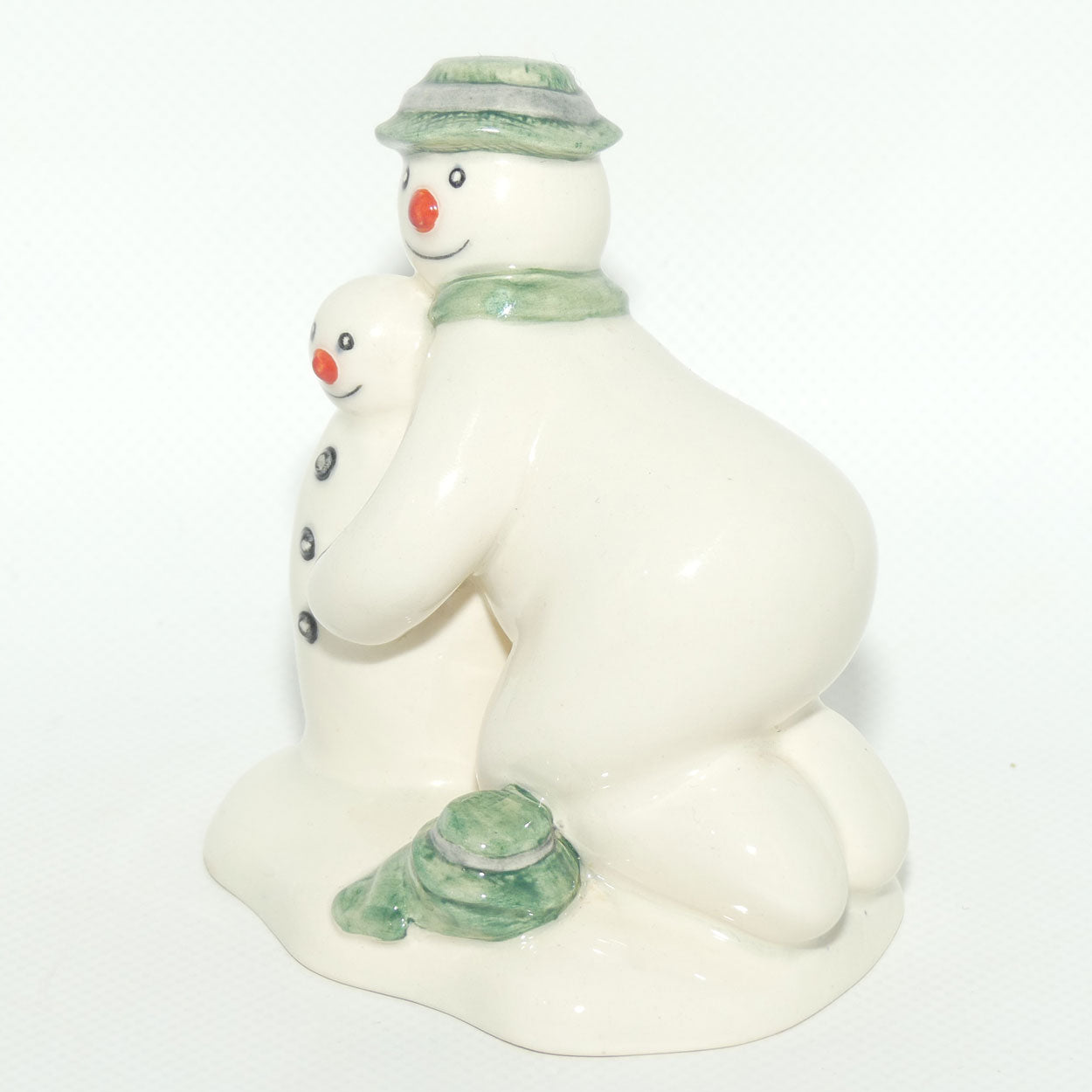 DS23 Royal Doulton Snowman figure Building the Snowman