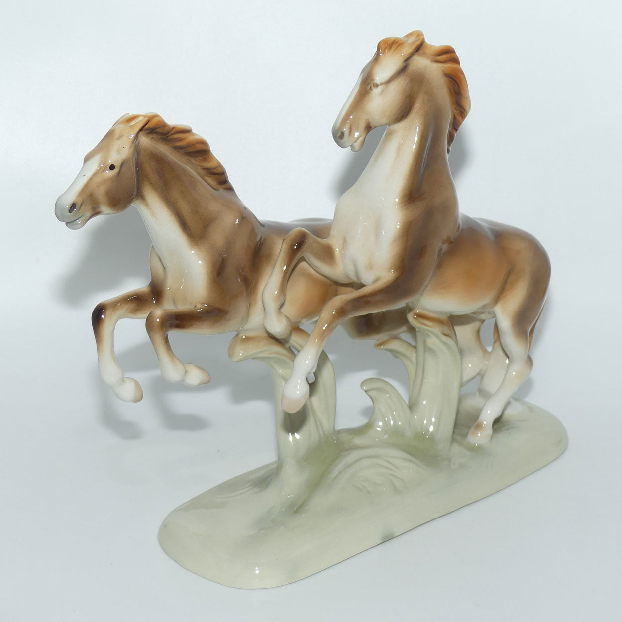 Royal Dux figure group of Rampant Horses