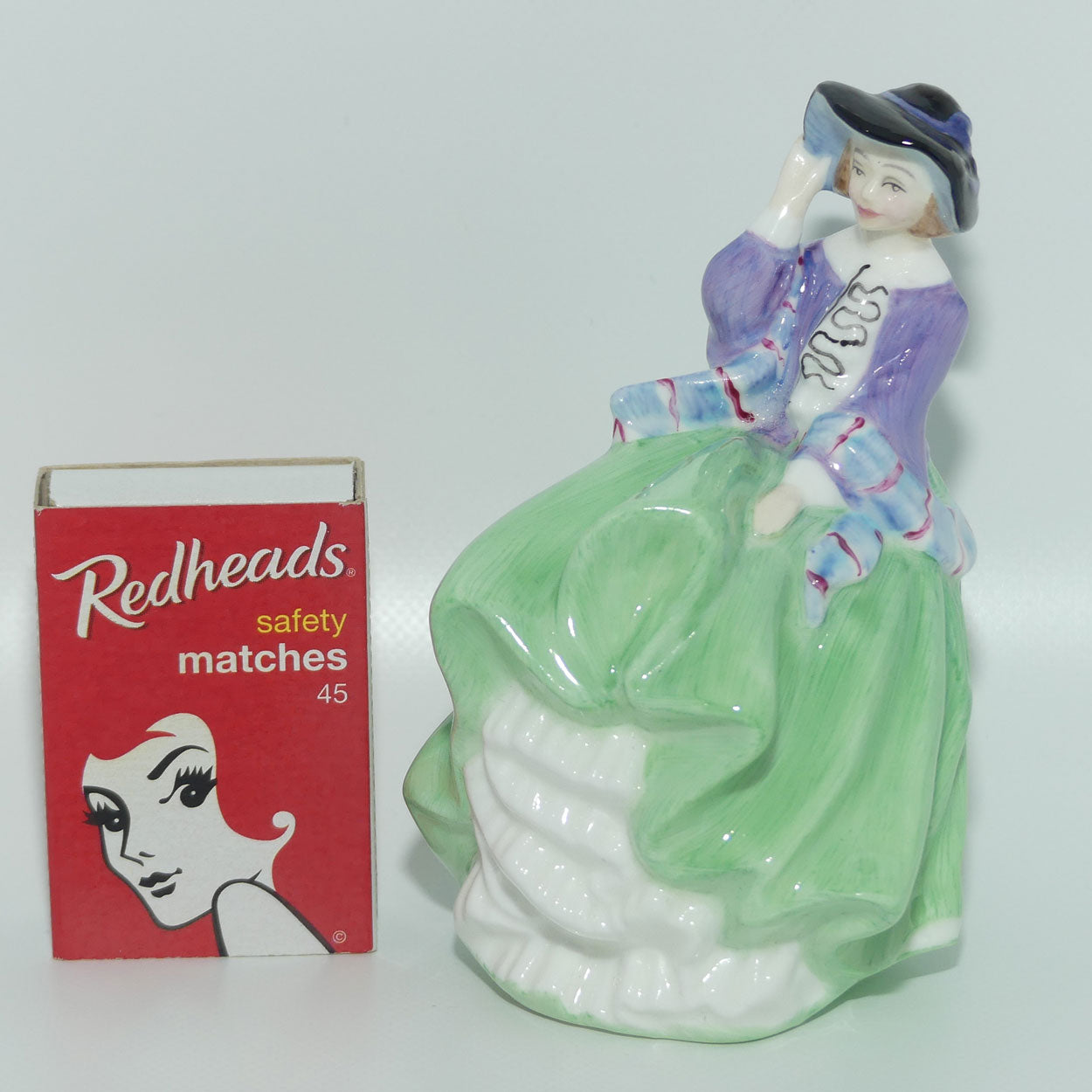 HN2126 Royal Doulton miniature figure Top o the Hill | Green and Mauve 