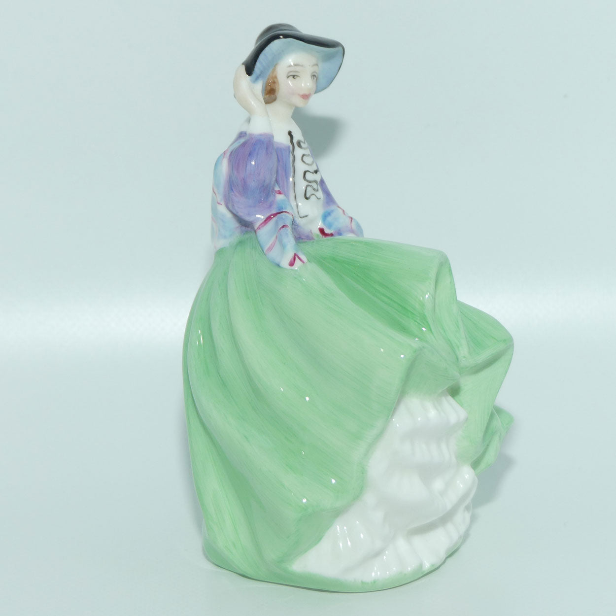 HN2126 Royal Doulton miniature figure Top o the Hill | Green and Mauve 