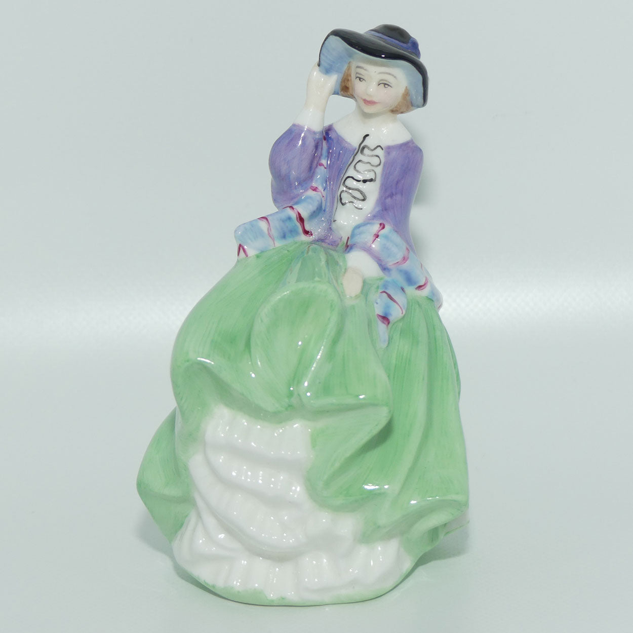 HN2126 Royal Doulton miniature figure Top o the Hill | Green and Mauve 