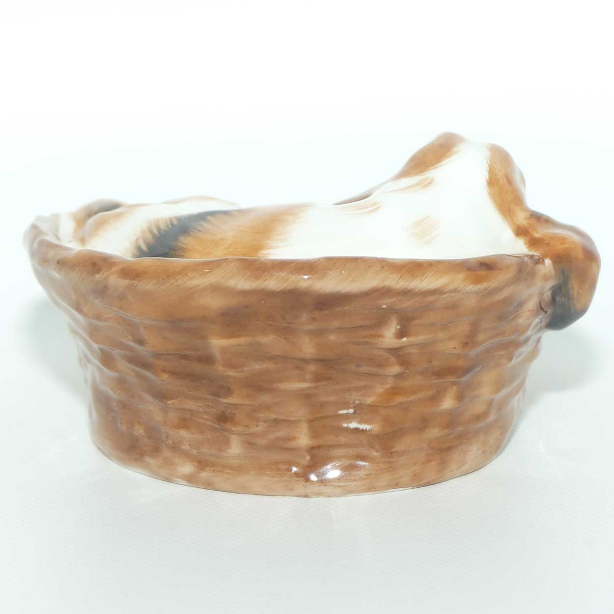 HN2585 Royal Doulton Cocker Spaniel Lying in a Basket