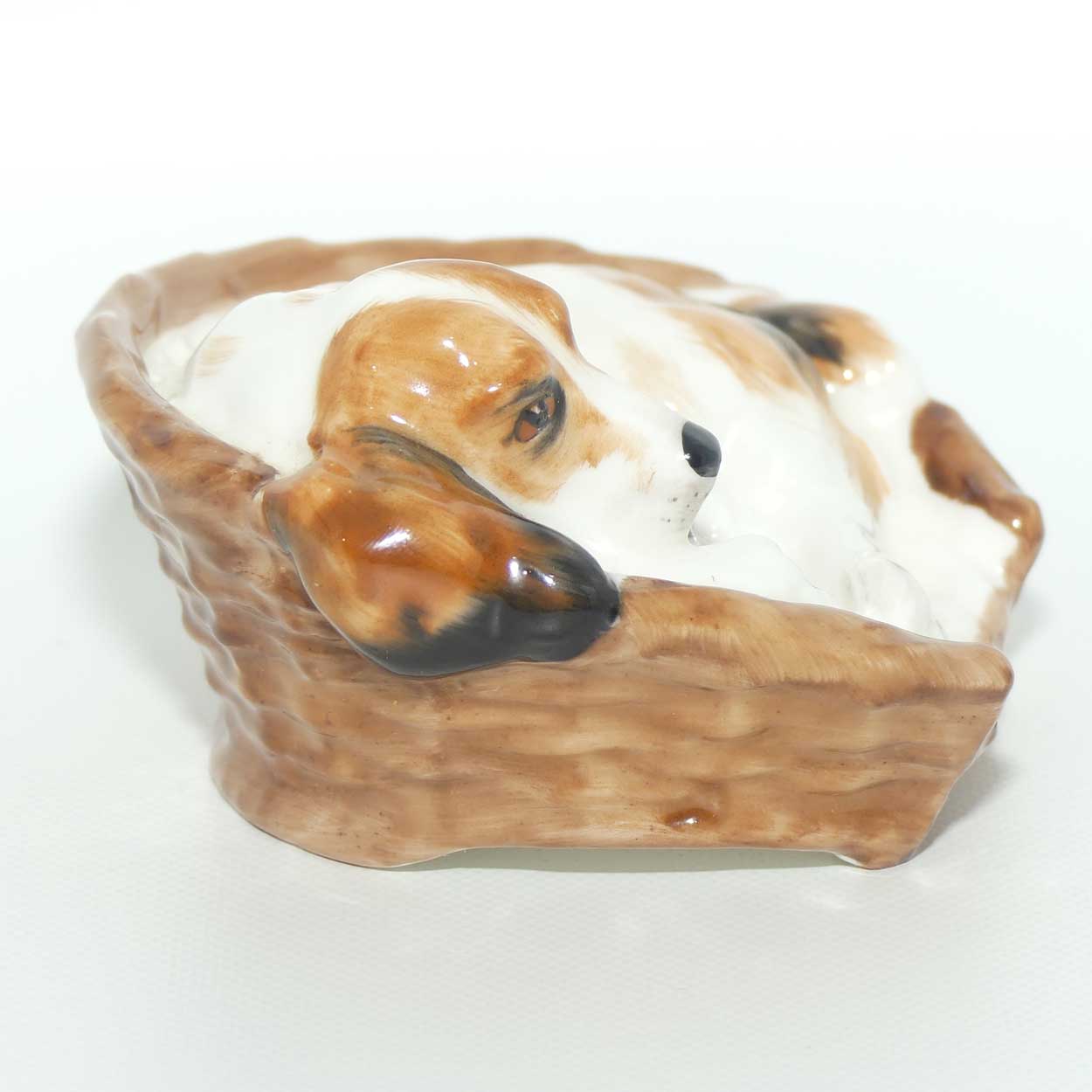 HN2585 Royal Doulton Cocker Spaniel Lying in a Basket