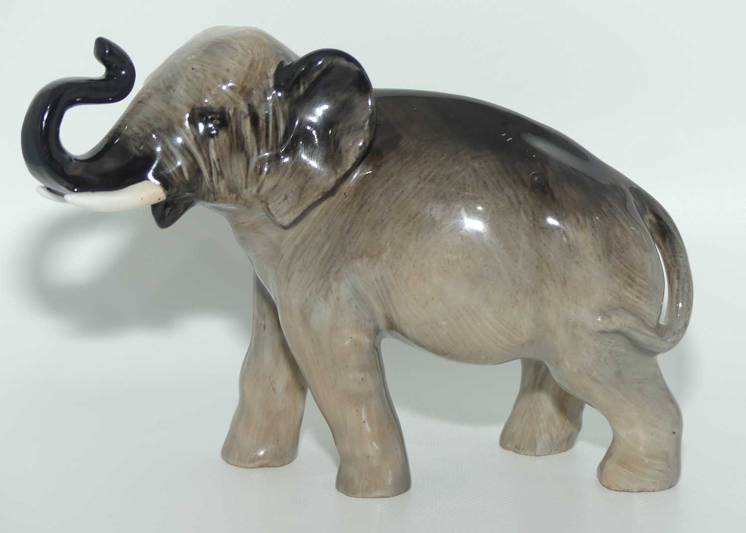 HN2644 Royal Doulton Elephant Trunk in Salute (Grey)