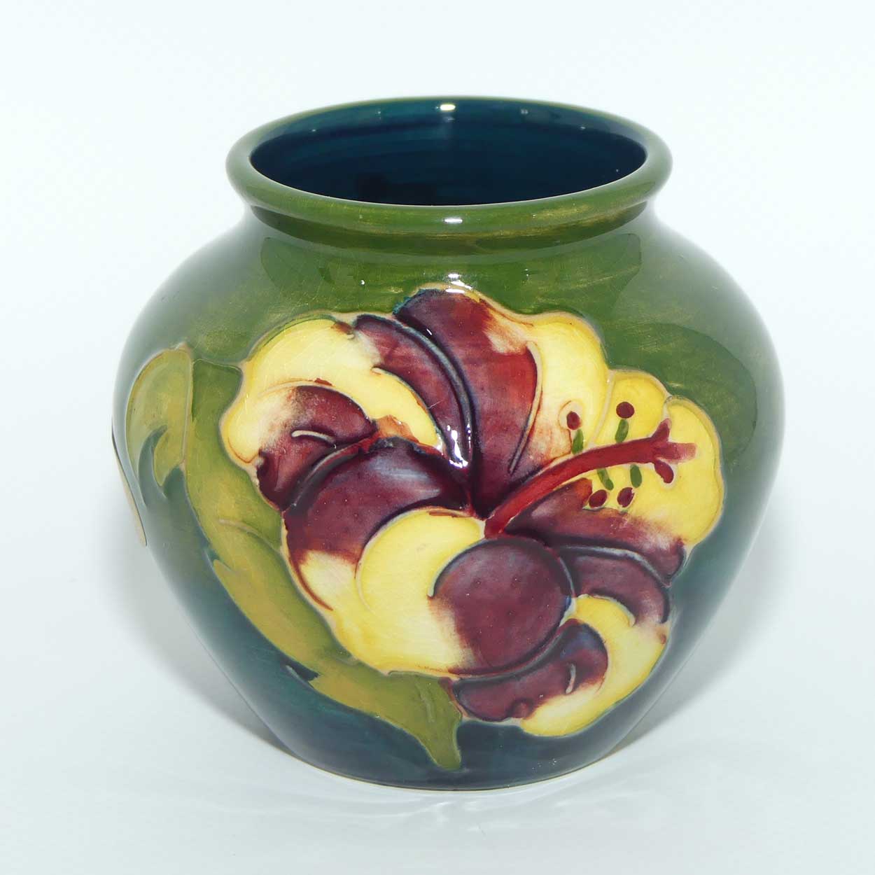 Walter Moorcroft Hibiscus on Green Ground vase | miniature round shape
