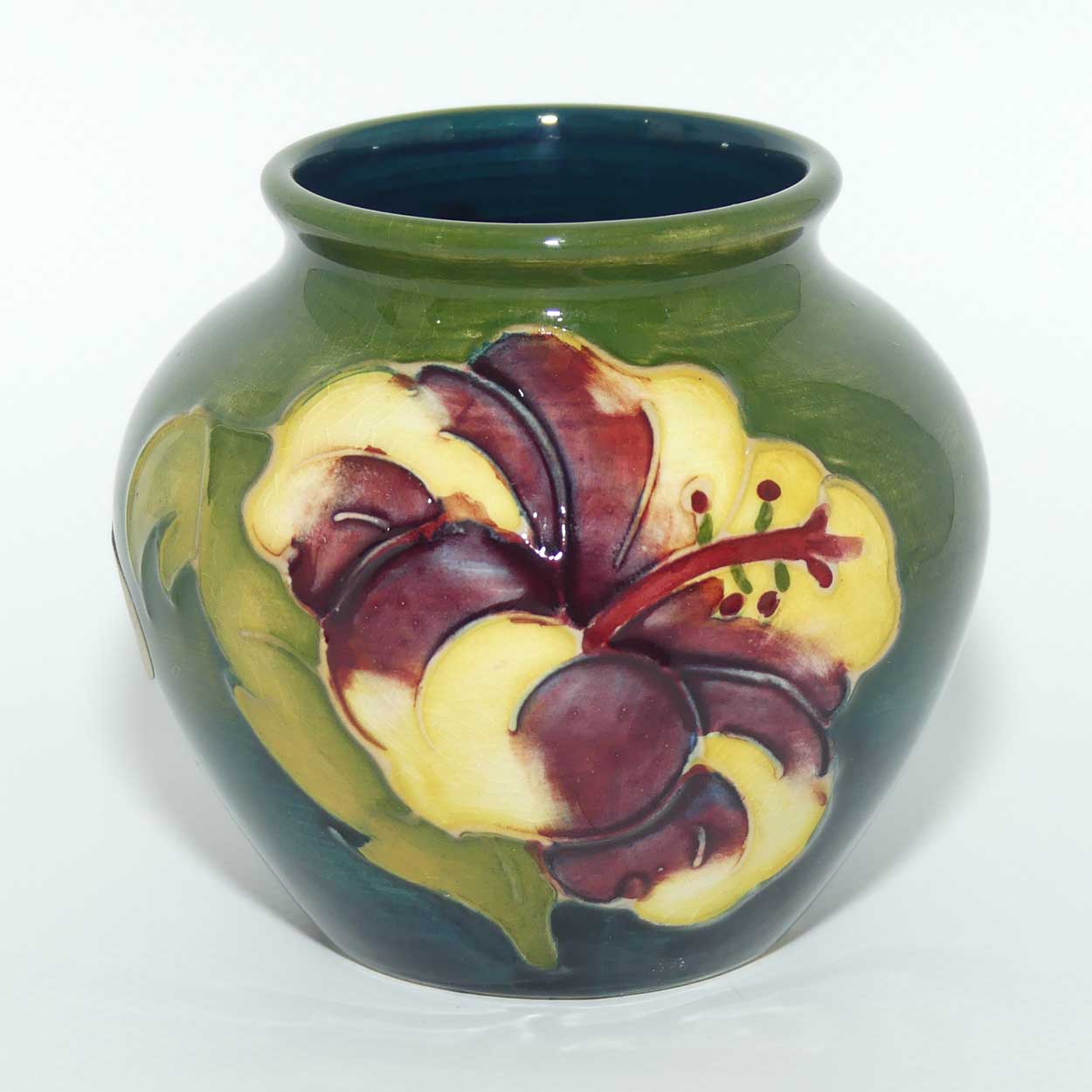 Walter Moorcroft Hibiscus on Green Ground vase | miniature round shape