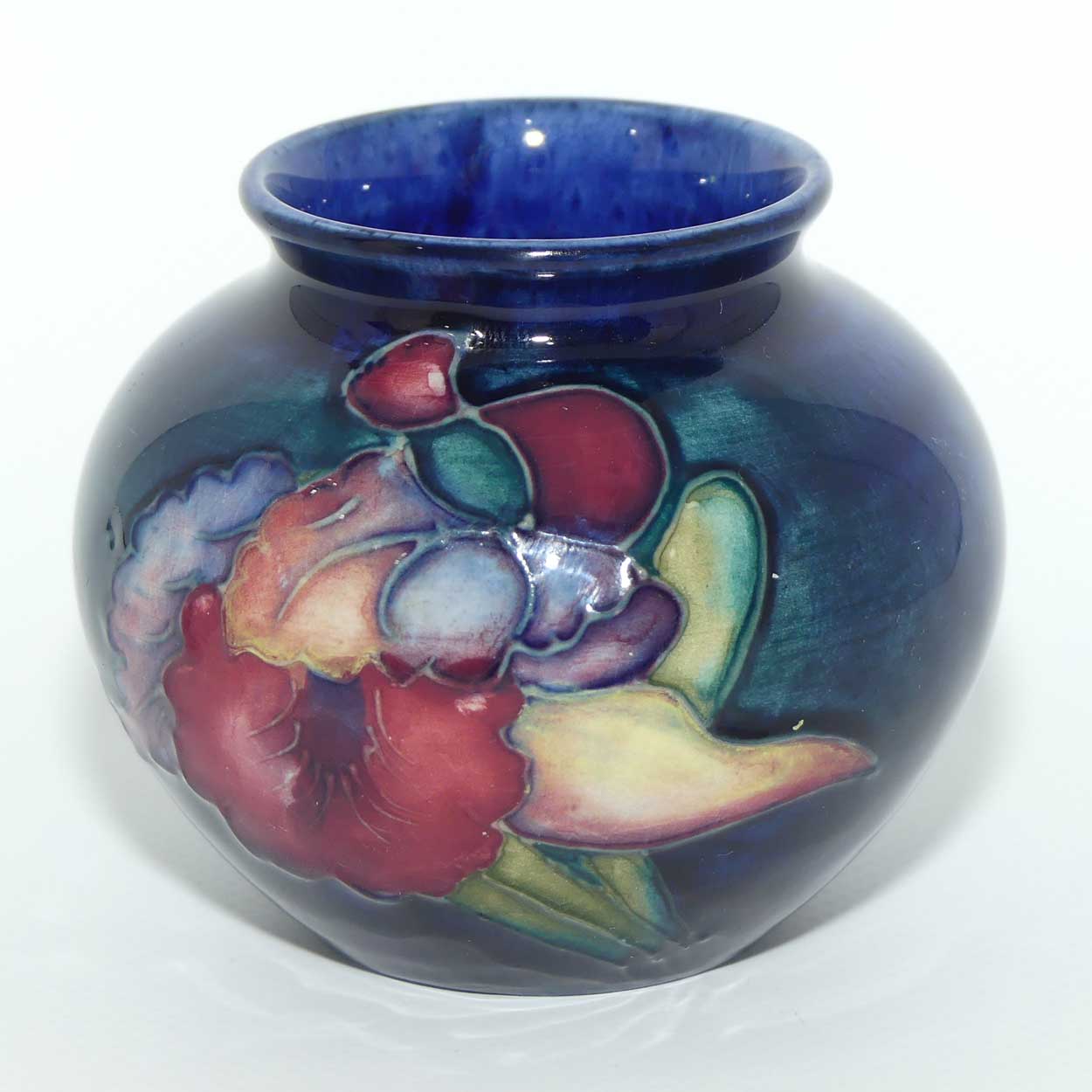 Walter Moorcroft Orchid on Blue Ground vase | miniature round shape