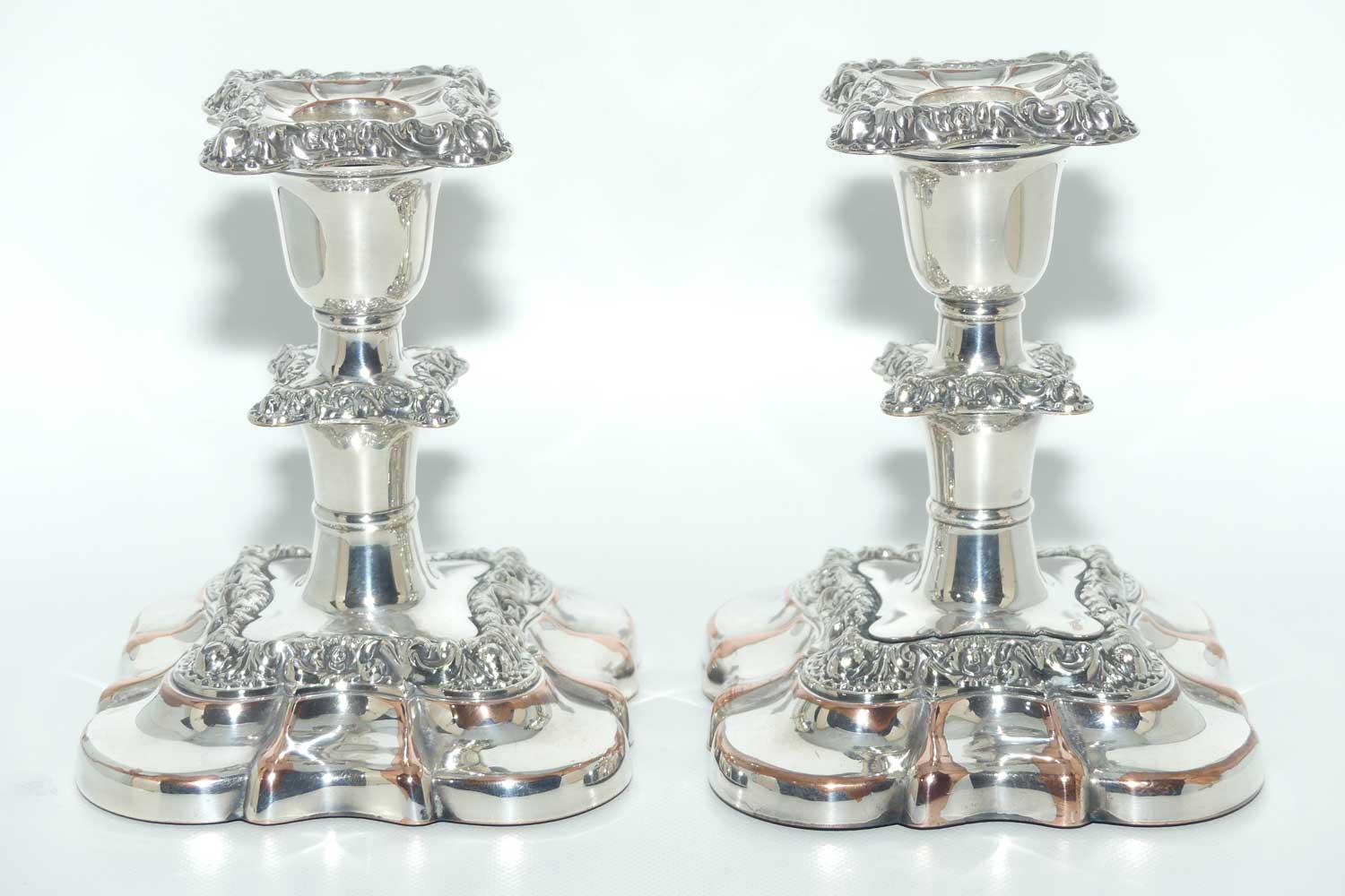Charming pair of Old Sheffield plate table candleholders