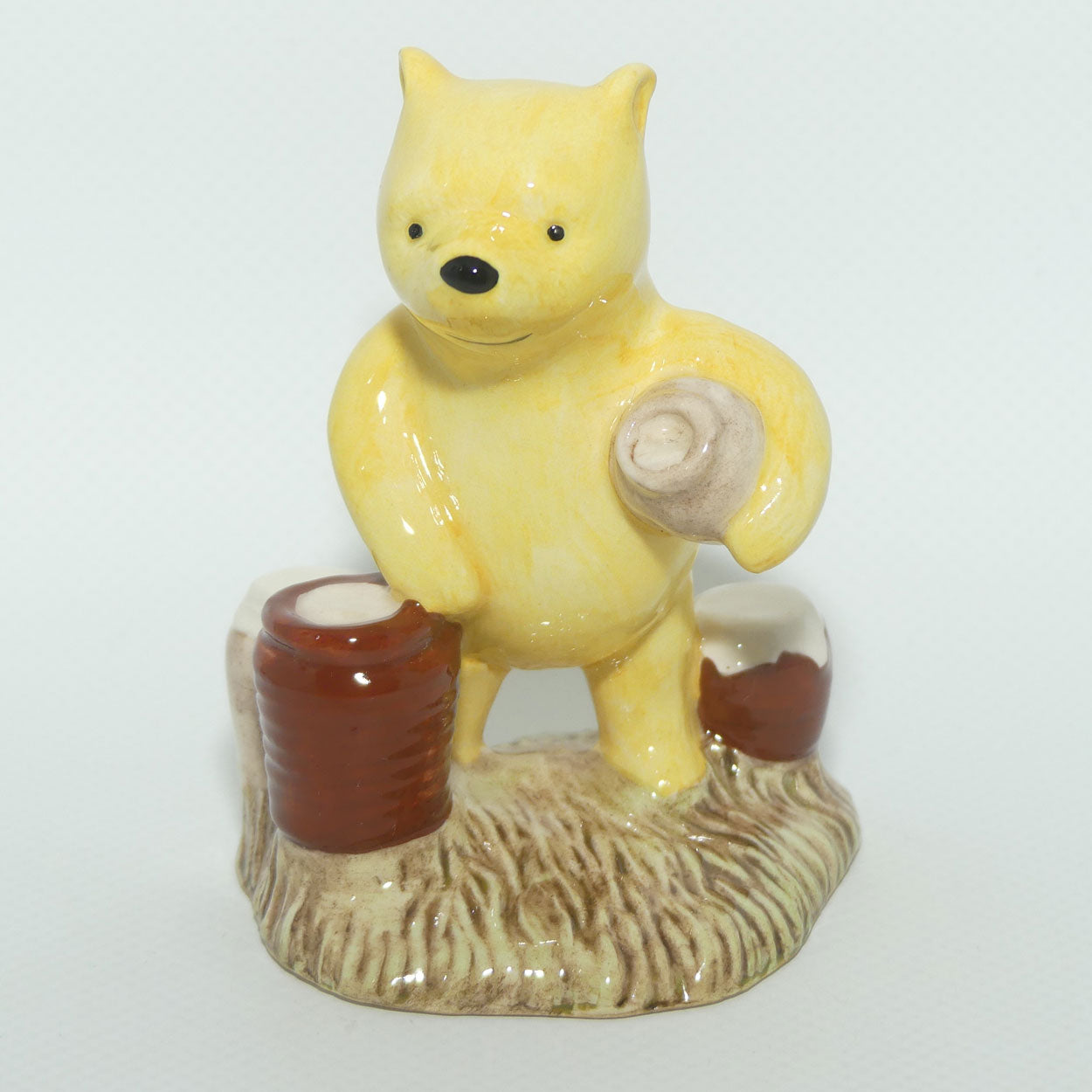 WP12 Royal Doulton Winnie the Pooh figure | Pooh Counting the Honeypots